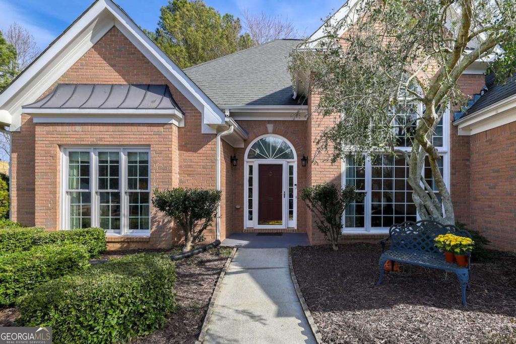 Photo of 1224 Spruce Creek Lane, Lawrenceville, GA 30045 (MLS # 10678239)