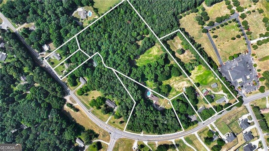 Discover 17+/- total acres nestled in one of the hottest and most sought-after areas! The land is not in the Mulberry district it's Gwinnett county unincorporated. This unique offering includes 5 separate parcels, each featuring an income-producing rental home currently leased. 6 rentals bring in 10k a month currently. Strategically positioned with continuous parcels and imminent road expansion plans to widen Hamilton Mill to 4 lanes, this property is set for substantial growth and accessibility improvements.    Currently zoned for residential use, this versatile land holds immense potential for mixed-use development, capitalizing on its proximity to a major intersection and boasting 3 points of ingress and egress to interstates. With the promise of increased connectivity and convenience, now is the time to secure this exceptional investment opportunity.    Don't miss out on this chance to own a piece of prime real estate poised for significant appreciation and development in a thriving community!