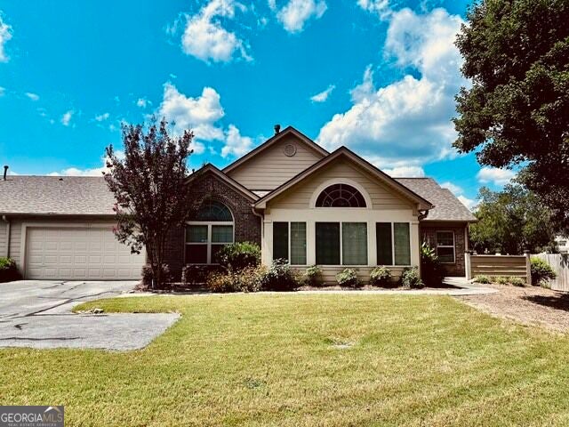 Photo of 1303 Silver Summit Drive SE, Conyers, GA 30094 (MLS # 10850268)