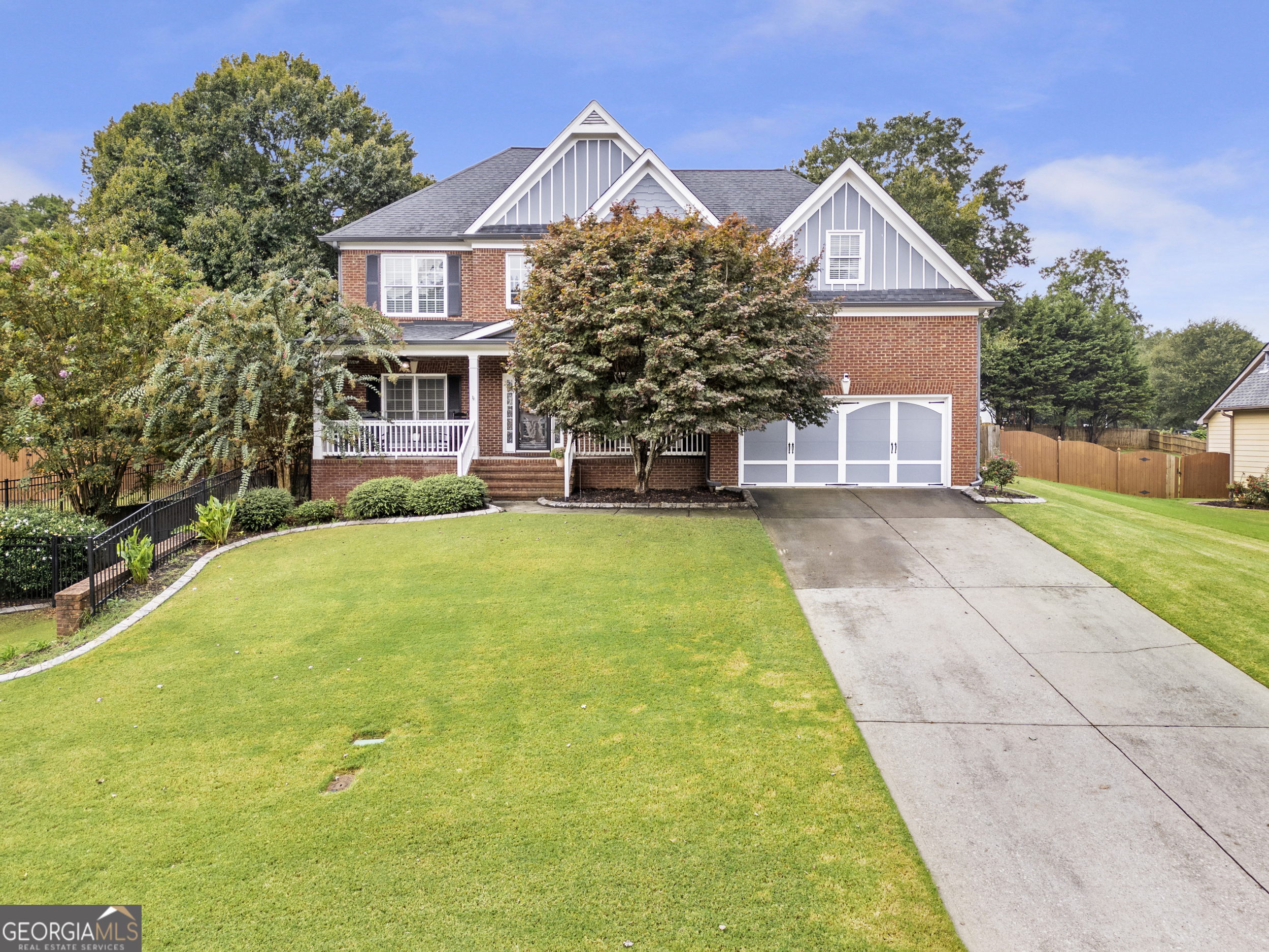 Welcome to this inviting 5-bedroom, 4-bath home in Winder, Georgia, with a fully finished basement and space for everyone. The main level includes a bedroom and full bath, perfect for guests. Upstairs, the spacious owner's suite offers a relaxing retreat with a private en suite. The heart of the home is the open kitchen with island and breakfast area, flowing into the two-story great room where family can gather and create memories. The finished basement adds even more room to enjoy with a large living room, private entrance, and plenty of storage. Outside, the secluded backyard is a welcoming spot for morning coffee, family barbecues, or evenings with friends.