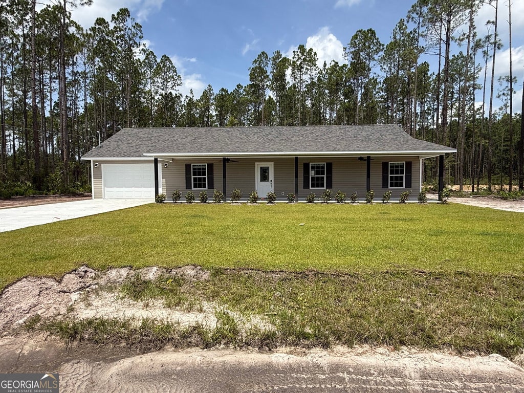 Photo of 5487 Old Waynesville Road, Waynesville, GA 31566 (MLS # 10814858)