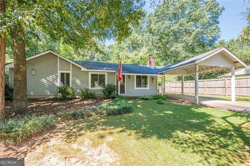 Welcome to this updated 3-bedroom, 1-bathroom ranch-style home located in a highly desirable Alpharetta neighborhood. Nestled on a spacious and level .3+ acre lot, this property offers a large yard perfect for outdoor entertaining, gardening, or future expansion. With no HOA restrictions, this home presents an incredible opportunity for investors, builders, or anyone looking to plant roots in one of Alpharetta's fastest-growing communities. Whether you are envisioning a full renovation, a custom new build, or simply enjoying the home as it is, the potential here is undeniable. Ideally situated just minutes from Wills Park, local dog parks, ball fields, and community pools, the location is ideal for those who enjoy an active lifestyle. Enjoy quick access to the vibrant Downtown Alpharetta and the popular shops, dining, and entertainment at The Maxwell. The Alpharetta Greenway is also nearby, just a short drive away. Commuting is easy with convenient access to GA-400, connecting you to the rest of the metro area. Surrounded by a mix of beautifully renovated homes and high-end new construction, Alpha Park is a neighborhood undergoing transformation, offering both charm and long-term value. Whether you are looking to build your dream home or invest in a thriving market, this property offers strong potential in a location that continues to grow in demand. Do not miss this opportunity to own a well-located property in one of Alpharetta's most desirable neighborhoods. Schedule your showing today.