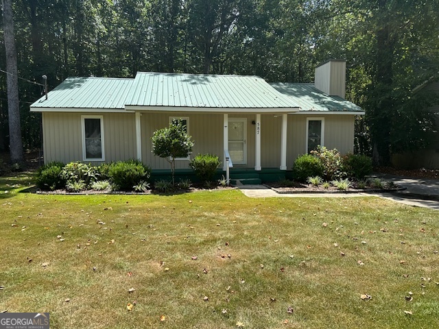 Looking for squeaky clean and move-in ready? This home is for you! It features a beautifully renovated kitchen and baths, stone fireplace, grilling deck off the sunroom and a workshop in the back yard. You will also enjoy the low maintenance vinyl siding and metal roof. All appliances including the washer/dryer remain. To view, give me a call or contact your favorite agent.