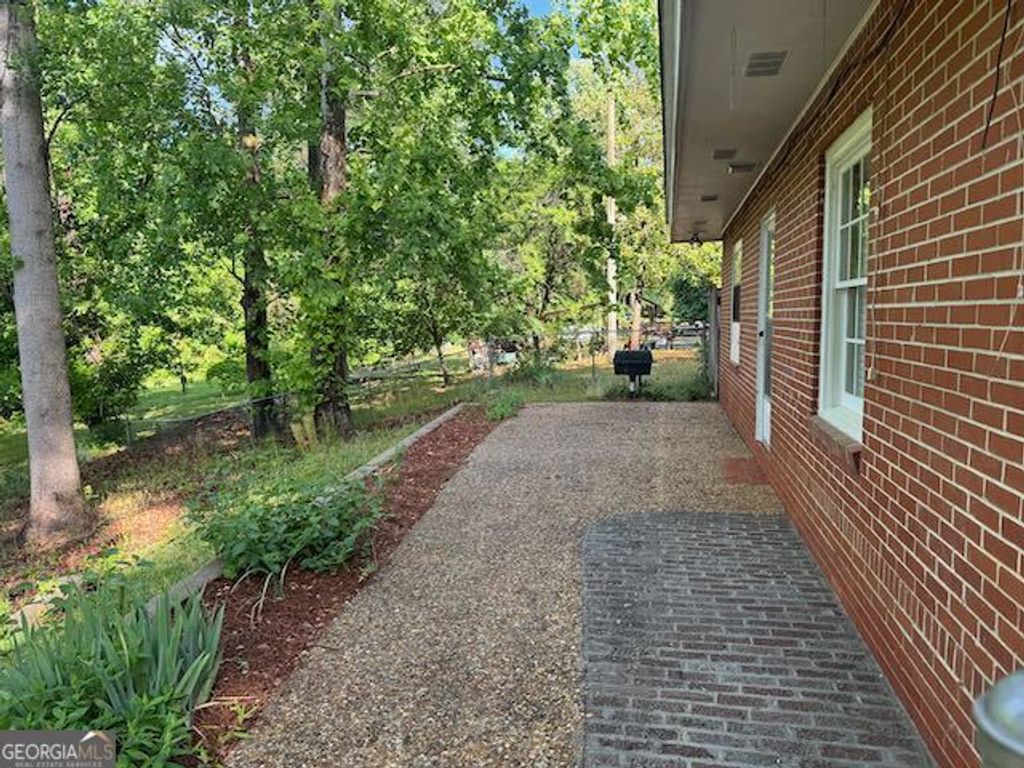 Photo of 605 W Haynes Street, Sandersville, GA 31082 (MLS # 10757830)