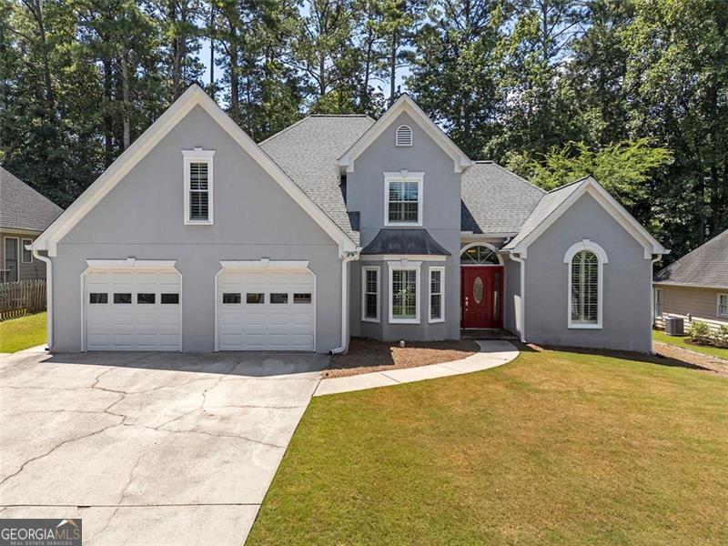 An incredible opportunity awaits in this sought-after Southlands swim and tennis community! This 4 bedroom 3.5 bath, one-owner home, with double primary bedrooms offers versatility and instant equity for first time buyers or investors looking to expand their real estate portfolios. Step through the brand-new RED front door into a freshly painted interior gleaming with hardwood floors and natural light from NEW double-pane windows. The heart of the home is the inviting living room, centered around a beautiful stone fireplace with gas logs. Prepare meals in the updated kitchen, boasting NEW stainless steel appliances (including refrigerator), NEW quartz countertops, and a convenient breakfast bar. Serve family meals in the formal dining room off the kitchen or bask in year-round light in the stunning sunroom, with vaulted ceiling and floor-to-ceiling windows. Unwind in your main-level primary suite, featuring double closets and a spa-like ensuite with a soaking tub, separate shower, and dual separate vanities with NEW quartz countertops. Upstairs, discover the incredible flexibility of a second primary suite, complete with its own vaulted ceilings and luxurious full bath. This level also includes another bedroom, a full bath, and a versatile, oversized bonus room-perfect for a media room, gym, or potential 5th bedroom. Step out to the HUGE backyard that's ready for kids, pets, a pool, you name it! Enjoy total confidence knowing the major updates are done! This home features a NEW ROOF -with a 50-year warranty (Dec 2024), a new 200-amp electrical panel (2025), NEW GUTTERS (2025). Priced to sell and sold "as-is," this is a fabulous opportunity for a first-time buyer or savvy investor. Don't miss your chance to own a move-in-ready gem!