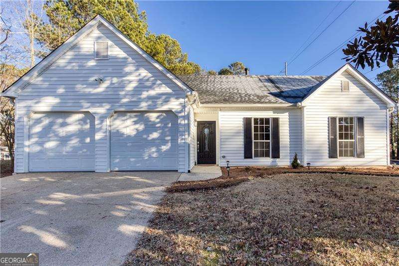 Save money when you buy this home by using our Preferred Lender, Darryl White of Edge Home Finance (m: 770-335-5078, NMLS ID 2186361). Tell him you are interested in a Southern Girl Home Buyers' home and ask about $0-Down financing, 1%-Down Conventional mortgages, Rate Buydowns, how to get Low-to-No Closing Costs, and other financing options available to our home buyers through August 31st. Act quickly and you could make this your home by Labor Day. PRICED TO SELL, below appraised value and tax assessment value. Welcome home!! This beautifully more new than old, renovated 4/3 with the master-on-main boasts extensive upgrades, including a new roof, garage doors, electrical system, kitchen featuring sleek quartz countertops, pantry, and island with a bar, as well as luxurious vinyl plank (LVP) flooring and plush carpet throughout. Enjoy the comfort and reassurance of a new HVAC system and enhanced spray foam insulation that will cut energy cost drastically. Substantial updates have been made to the plumbing and siding, with all work completed under permit and certified with a final Certificate of Occupancy. The spacious attic has been transformed into a functional living area, offering a bonus room, additional bedroom, and a full bathroom. This home has been thoughtfully restored to combine modern amenities with a new feel. Schedule your showing today and experience contemporary living at its finest.