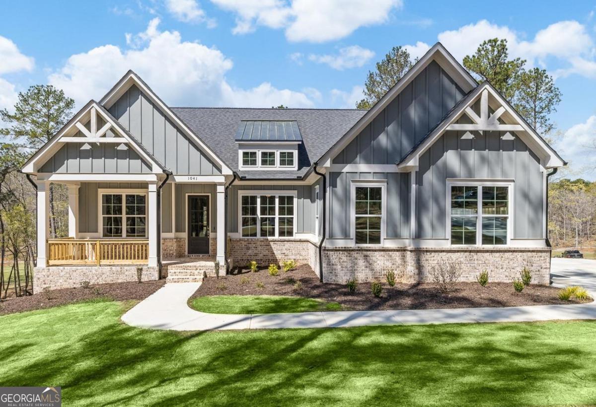 FABULOUS NEW PRICE for this Golf-Front Luxury in Harbor Club! Brand-new Emmeline plan by Waterford Homes with sweeping views of two Morrish-Weiskopf golf holes. Bathed in natural light, the open design showcases a light and bright gourmet kitchen with central island, gas cooktop, and double ovens flowing into a great room with beamed cathedral ceiling. Step outside to an entertainer's dream: oversized screened porch with fireplace, open-air deck, and lower-level patio. The primary suite offers a spa-inspired bath, massive closet, and direct laundry access. Main level also includes a guest suite and private office. Terrace level expands the living space with 2 bedrooms, 2 baths, a recreation room, plus abundant storage or workshop potential. Three-car garage. Harbor Club amenities include fitness, pickleball, tennis, pool, marina, clubhouse dining, and more. Come claim your slice of heaven.