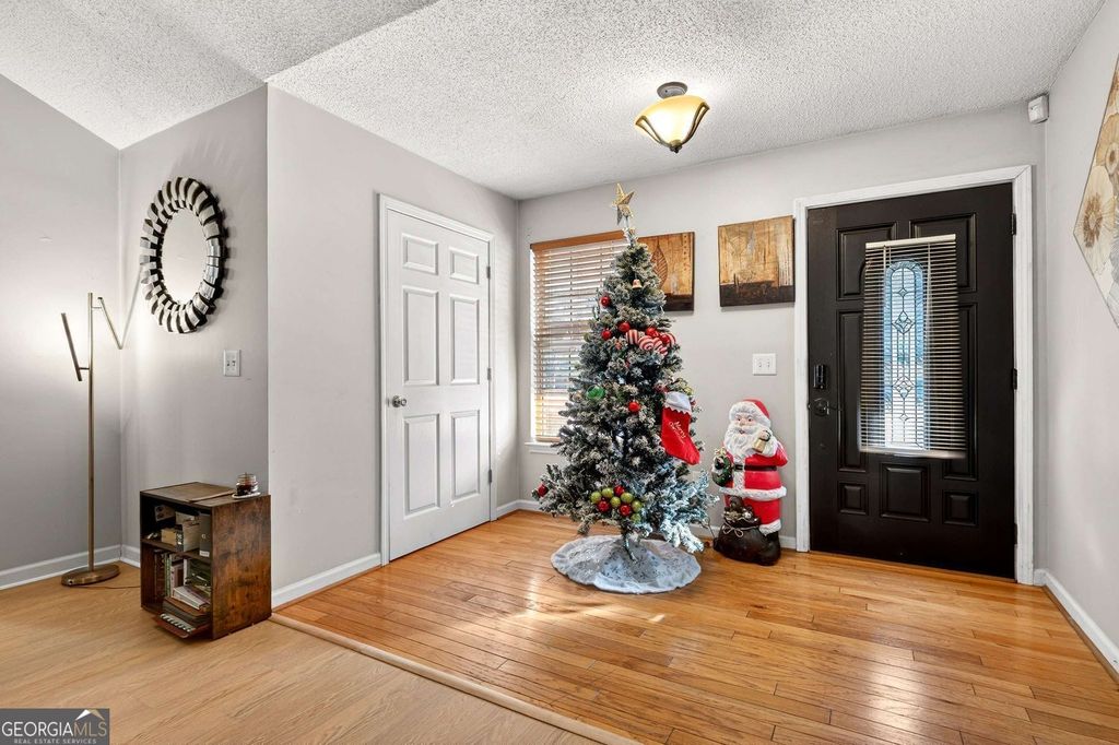 Photo of 408 Strathmore Drive, Sharpsburg, GA 30277 (MLS # 10657064)