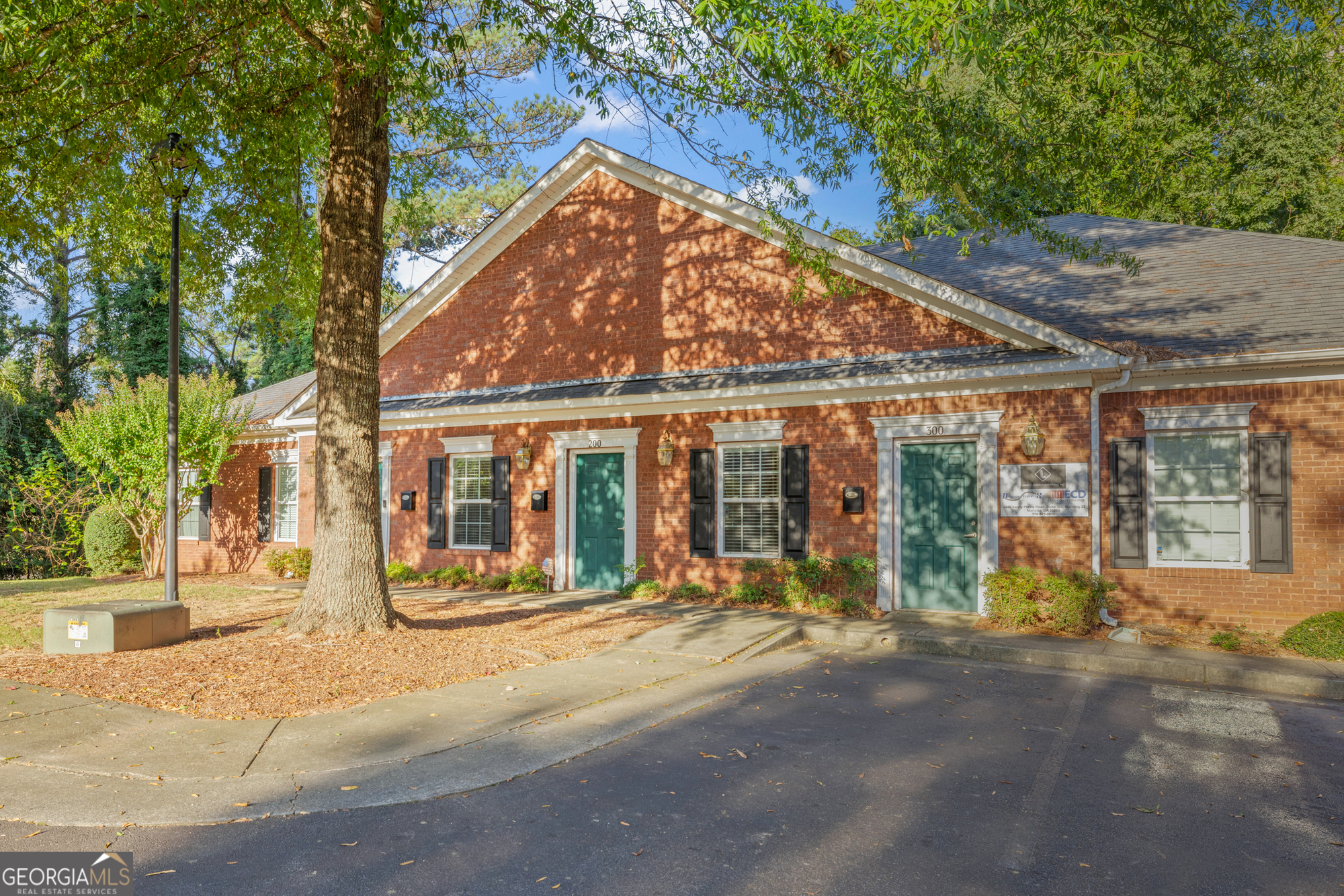 Located in the highly desirable Sandy Plains Executive Office Park, directly across from Sprayberry High School and near East Piedmont Road, this office offers exceptional accessibility and convenience. The suite is ADA accessible and situated in a one-story building at the rear of the office park, ensuring privacy and ease of access. The office is approximately 1,068 square feet, with an option to combine with adjacent space, bringing the total square footage to 3,204 square feet. The suite features reception/waiting area, 4 offices, bathroom, small sink and spacious break/kitchen area. With a prime location and ample parking, this office is perfect for businesses looking to establish or expand their presence in a thriving area.