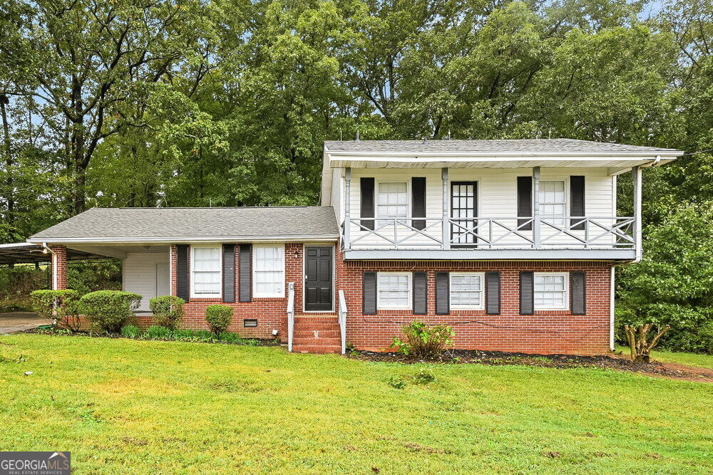 Photo of 513 Martins Chapel Road, Lawrenceville, GA 30045 (MLS # 10880330)