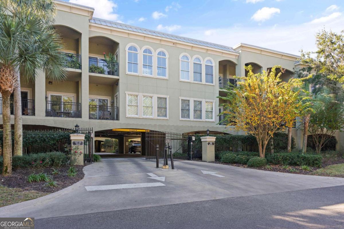 This delightful 1-bedroom, 1-bathroom efficiency offers the perfect blend of comfort and convenience. Just minutes from the beaches and Village of St. Simons Island, this property boasts a cozy living/bedroom space, a luxurious whirlpool bath paired with a separate shower, and a private balcony ideal for enjoying the serene surroundings. Sold fully furnished and completely turn-key, it is a great investment opportunity, with a good rental history. The gated community features lovely landscaping, a refreshing pool, and a parking garage, ensuring both security and leisure in a prime island location. The property is in a rental program so please check availability to see. There is an anticipated HOA assessment for exterior repairs to the building, and the seller is prepared to offer assistance toward the assessment. May not qualify for conventional financing due to the projected repairs. Local bank financing or cash best options.