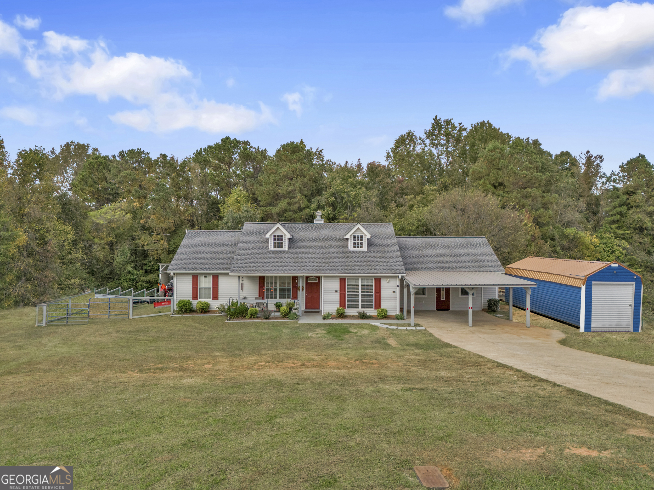 A Must-See Home in a quiet neighborhood! Welcome to this beautifully remodeled ranch home that's ready for you! With 3 spacious bedrooms, including a master suite separate from the other two bedrooms, and 2 bathrooms, this house is ready for its new owners! The open living room features a cozy gas log fireplace, and the kitchen comes with a handy pantry, brand new stainless steel appliances, granite countertops, and tiled backsplash! One of the impressive features of this home is the converted garage, which now offers over 400+ sq ft of additional flexible space. This could be a great spot for holiday gatherings, a home office, a game room/ man cave, a nursery or even another bedroom if you need it. Step outside to enjoy the backyard, where you'll find a charming stone area perfect for a fire pit and a covered porch ideal for BBQs and entertaining. The owners have added a security system and plenty of solar motion sensored lights that will stay with the home. Plus, there's a custom-built boat house and an attached utility shed for all your outdoor tools and hobbies! There's also a spacious 2-car carport that you could close in to make a garage if you'd like. With a RV parking pad and RV plug on the side of the home, you have extra convenience too! Inside, The attic is a great bonus, offering tons of space for potential extra bedrooms and bathrooms! If that didn't entice you enough: location, location, location! It is minutes from Ingles and dining! Also, located in the lovely Tri -Lake area, this home is just minutes from Jackson Lake, Lake Oconee, and Lake Sinclair. It's perfect for first-time homebuyers & families who want the convenience of everything on one level. The recent updates include a new roof, a new gas water heater, tile and LVP flooring throughout, custom lighting with hi-tech remote controlled features and the flex space to just name a few! The owners really paid attention to details with this home and you will very quickly notice it upon entry! Sitting on just over half an acre, the fenced backyard is perfect for kids and pets to play safely. Don't miss your chance to see this amazing home! Call Jasmyn at 478-251-0014 today to schedule a visit and get ready to make this dream home yours in time for the holidays!
