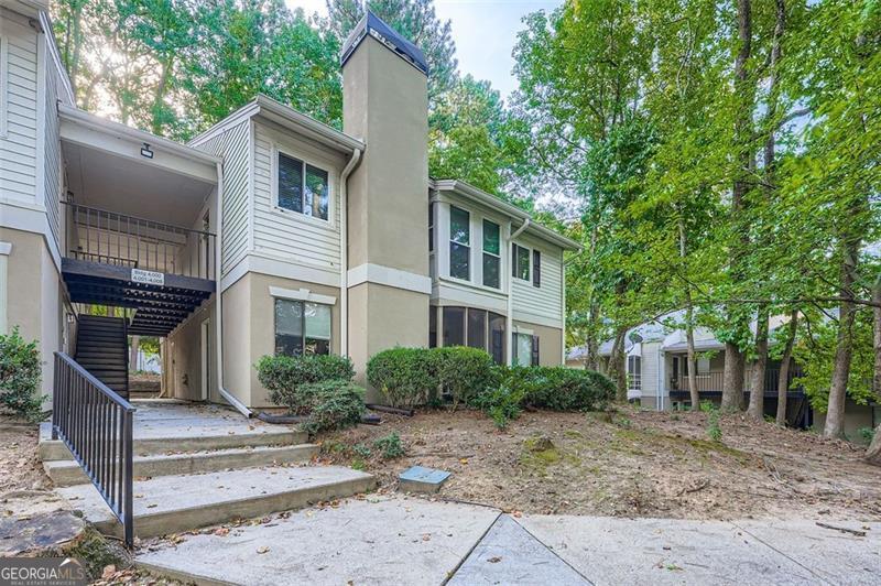 Beautifully Renovated 1BR/1BA Condo - No One Above! Completely updated from top to bottom, this stunning second-floor unit is move-in ready and full of upgrades. Enjoy brand-new LVP flooring throughout the living areas, kitchen, and bathroom, along with fresh interior paint. The updated kitchen features Corian countertops, a stylish tile backsplash, white cabinetry, and black appliances. The bathroom offers a quartz double vanity and a beautifully tiled glass shower. The spacious primary bedroom includes a large walk-in closet. Additional upgrades include windows ($3,200 investment) less than 5 years old, a redesigned floor plan for improved flow, and a 2-year-old A/C unit. Located in a desirable swim/tennis community just 3 minutes from GA-400, 8 minutes to Roswell or Alpharetta, and 15 minutes to Buckhead. Close to shopping, dining, and entertainment. Don't miss this opportunity-schedule your showing today!