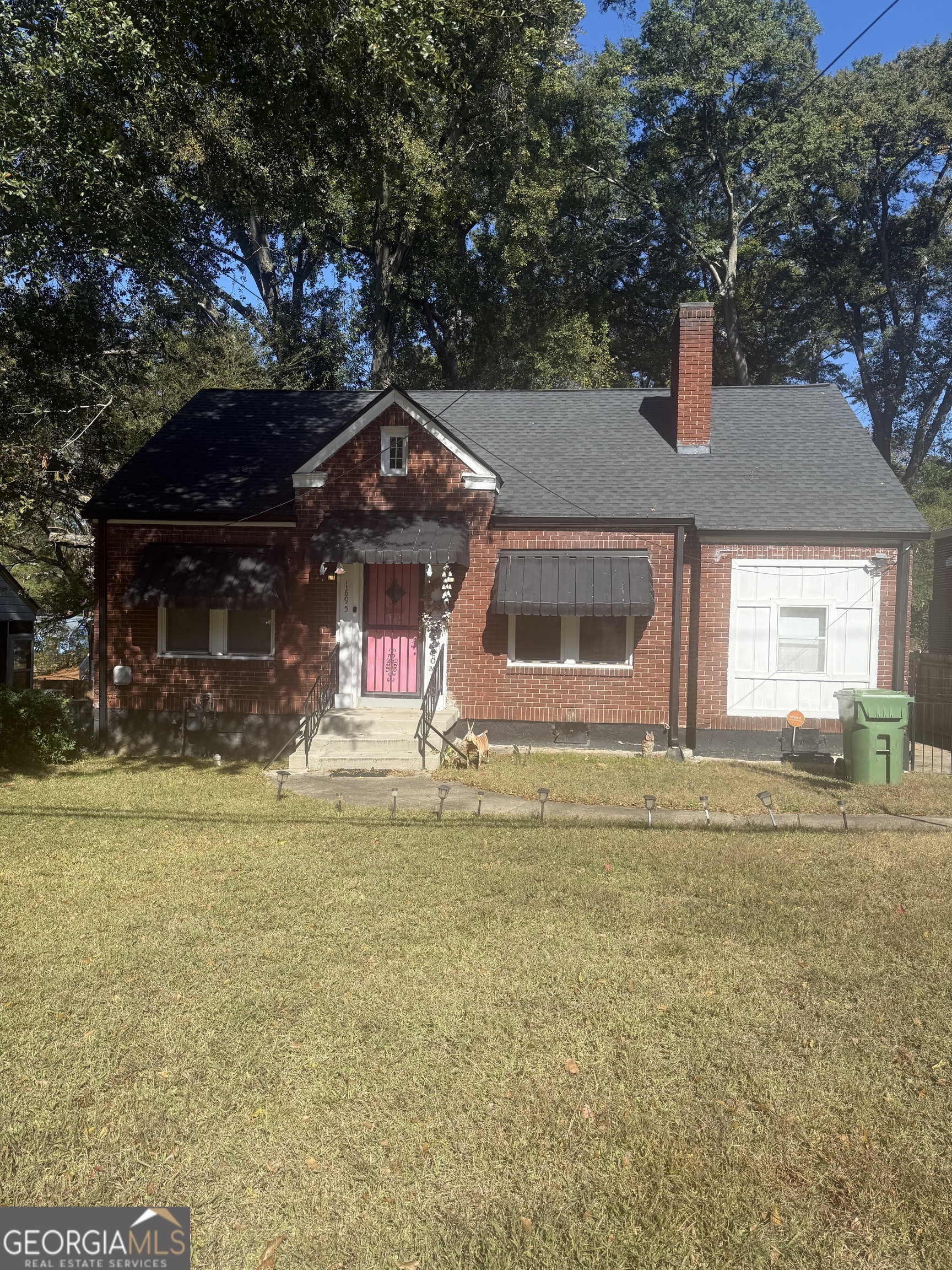 Welcome to 1695 Beecher Street SW , a solid 4-sided brick ranch nestled in one of Atlanta's most sought-after and rapidly appreciating neighborhoods. This 2-bedroom, 1-bath home sits on a full basement and offers approximately 1,170 sq. ft. of living space with room to expand making it a dream for investors, rehab specialists, or buyers ready to add their personal touch. All the major systems are already updated : Roof (approx. 5 years old) HVAC (approx. 5 years old) Electrical (approx. 5 years old) Hot water heater (fairly new) Inside, you'll find a separate living and dining area, plus a small bonus room that can easily be transformed into a home office, flex space, or additional bedroom. The spacious backyard offers endless possibilities imagine a tranquil garden, gazebo, or outdoor entertaining area. With renovated homes in the area selling for $500K+, this property presents an exceptional opportunity to build instant equity while crafting your ideal vision. Conveniently located near the BeltLine, parks, and major highways this gem is ready for its nextchapter! Sold As-Is | Investors Welcome | Don't Miss This Atlanta Classic!