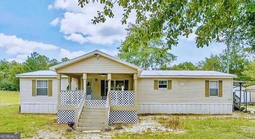 Welcome to 5002 Fulton Mill Rd, a spacious 1996 manufactured home offering comfortable living in a peaceful Macon setting. Set on a large open lot surrounded by nature, this home provides plenty of room to relax and enjoy the outdoors while remaining close to everyday conveniences. Just minutes from local shopping and dining along Hartley Bridge Road, and a short drive to Amerson River Park and the Ocmulgee River trails, this location blends quiet country charm with easy access to recreation. Nearby Windsor Academy and other area schools add to the appeal for those seeking convenience and community. With a welcoming front porch, generous living areas, and potential for your own personal touches, this property is ideal for anyone looking for value and space in a well-connected location. Come see the possibilities.