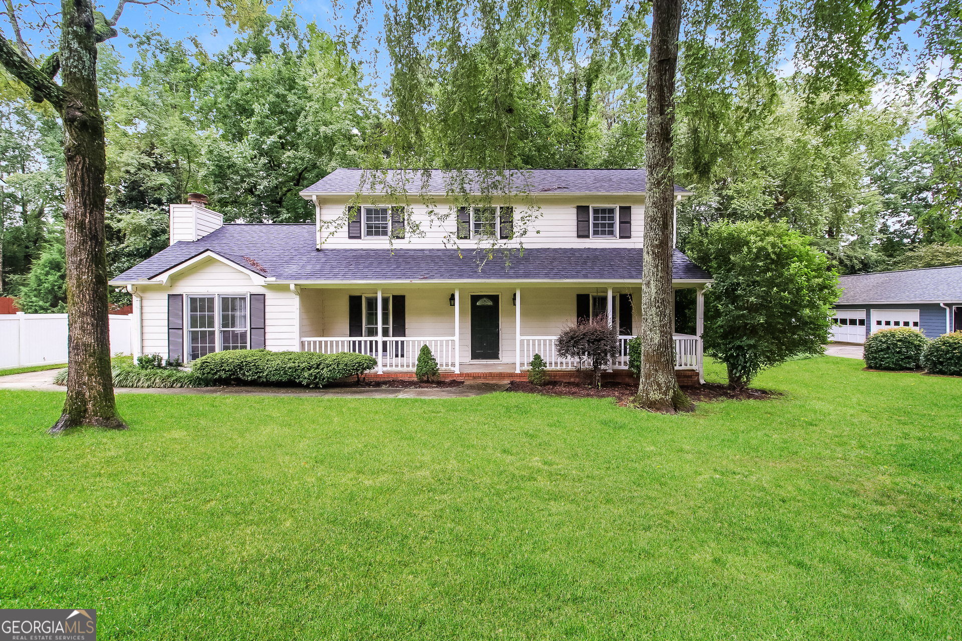 Beautiful 5 bedroom, 2.5 bathroom home located in Covington! This home has curb appeal - from the mature trees, landscaping, and large front porch - you will love to drive up to your new home. Once inside you will find a beautiful, wood-burning, all brick fireplace in the living room. The kitchen includes solid surface counter tops, updated backsplash, stainless steel appliances and updated cabinetry. Right off the kitchen is the formal dining room, perfect for entertaining! Or, take advantage of the eat-in kitchen with breakfast nook and peninsula seating. The primary bedroom features a ceiling fan and ensuite bathroom and walk in closet. The primary bathroom features updated vanity, mirror and fixtures. Enjoy your backyard from the sun room or step outside onto the deck. Schedule your showing today to see all that this home has to offer!