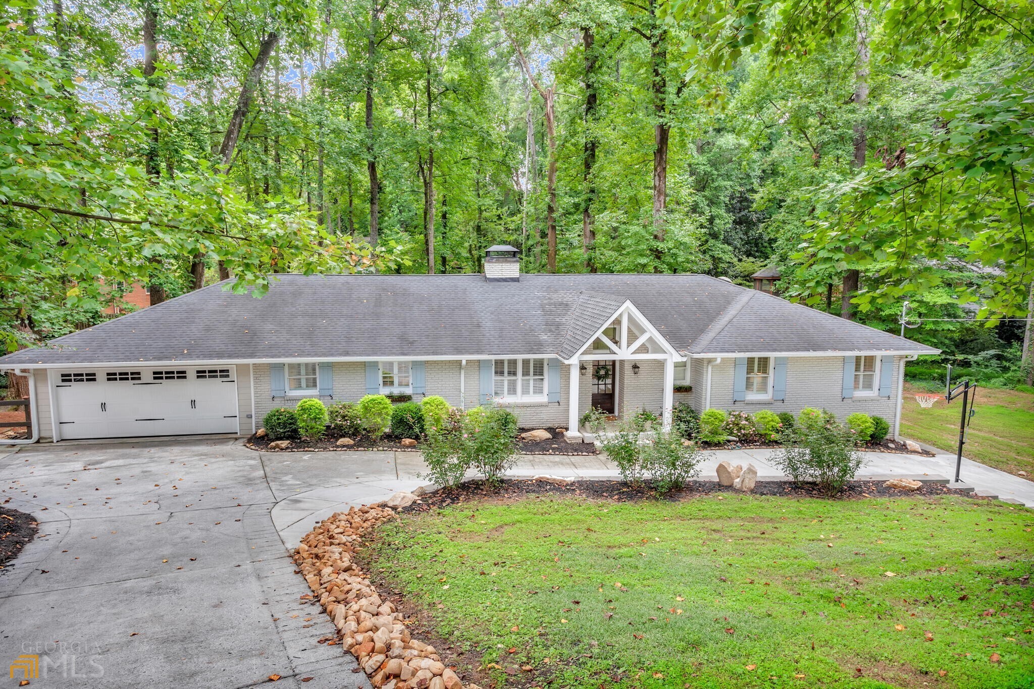 GORGEOUS FULLY REMODELED RANCH WITH OPEN FLOORPLAN ON OVER 1 ACRE FLAT PARK-LIKE BACKYARD. UPDATES INCLUDE ROOF,HVAC,WATER HEATER AND CONVRESION FROM SEPTIC TO CITY SEWER. AMAZING KITCHEN WITH QUARTZ COUNTERTOPS, HUGE BREAKFAST BAR AND CUSTOM CABINETS WITH GLASS INLAY OPENS TO GREAT ROOM WITH VAULTED SHIPLAP CEILINGS, DOUBLE SIDED FIREPLACE AND DUAL FRENCH DOORS. OWNERS SUITE HAS 2 LARGE CLOSETS,BUILT IN CABINETS AND LOTS OF WINDOWS. INCREDIBLE MASTER BATH RENOVATION WITH OVERSIZED CUSTOM TILED SHOWER AND DESIGNER LIGHTING. FINISHED TERRACE LEVEL WITH NANNY SUITE FEATURING FULL KITCHEN,FAMILY ROOM WITH FIREPLACE,FULL BATH,BEDROOM 3 OFFICE SPACES AND EXTERIOR ENTRANCE. CHARMING SCREENED IN PORCH AND HUGE DECK.HIGHLY SOUGHT AFTER CHASTAIN/CHEROKEE PARK SUBDIVISION. PRIVATE LOT THAT FEELS LIKE YOU ARE IN THE NORTH GEORGIA MOUNTAINS WITH NANCY CREEK RUNNING THROUGH THE PROPERTY. SHORT WALK TO CHASTAIN PARK,CONCERTS, AND LOCAL RESTAURANTS. GREAT SCHOOL DISTRICT.