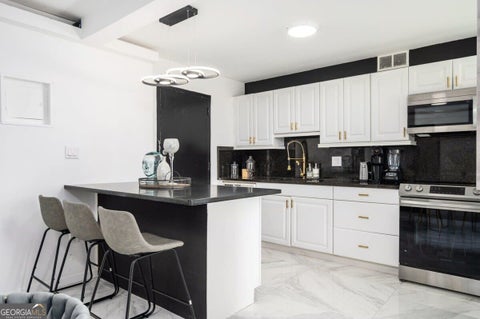 Photo of 215 Piedmont Avenue NE #707, Atlanta, GA 30308 (MLS # 10834512)