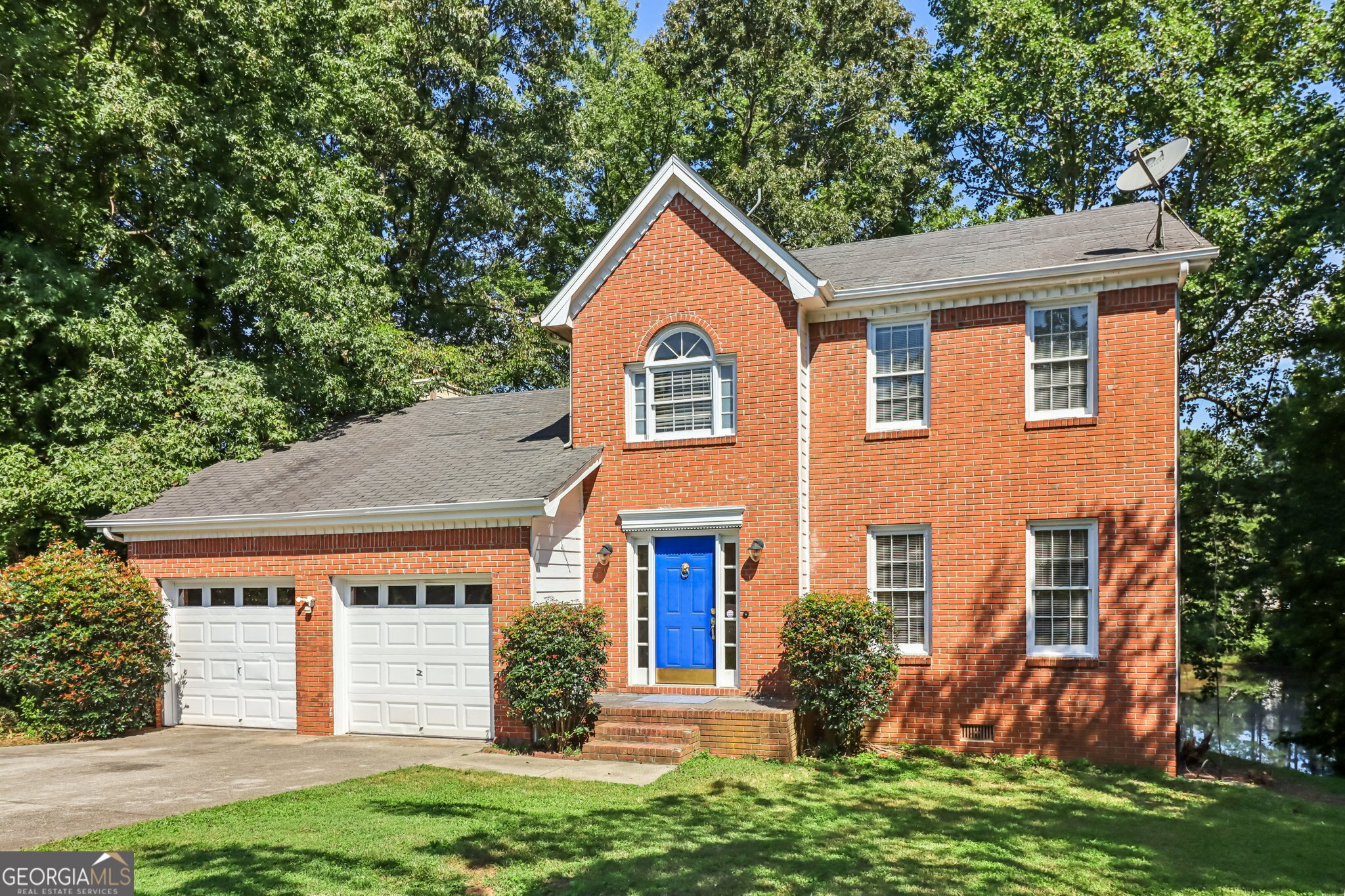 Spacious two-story home tucked away on a quiet cul-de-sac and set on more than 2.5 private acres! A sweeping front lawn welcomes you inside, where natural light fills the formal living and dining rooms, perfect for entertaining or everyday living. The updated kitchen is a standout, featuring painted cabinetry, new stainless steel appliances, and a sunny eat-in area for casual dining. Just beyond, the family room centers around a cozy brick fireplace, creating the perfect gathering spot. A convenient laundry room and half bath complete the main floor. Upstairs, retreat to the primary suite with its elegant tray ceiling and updated en-suite bath, complete with dual vanities, a soaking tub, and a fully tiled walk-in shower. Two spacious secondary bedrooms and a full hall bath provide plenty of room for everyone! Outdoor living is equally impressive, with a large deck designed for grilling, entertaining, or simply enjoying the tranquil views. The expansive backyard offers endless green space and backs to 2.6 acres of wooded privacy overlooking a serene pond. This property combines the best of neighborhood living with the peace and space of a private retreat. Book your tour today!