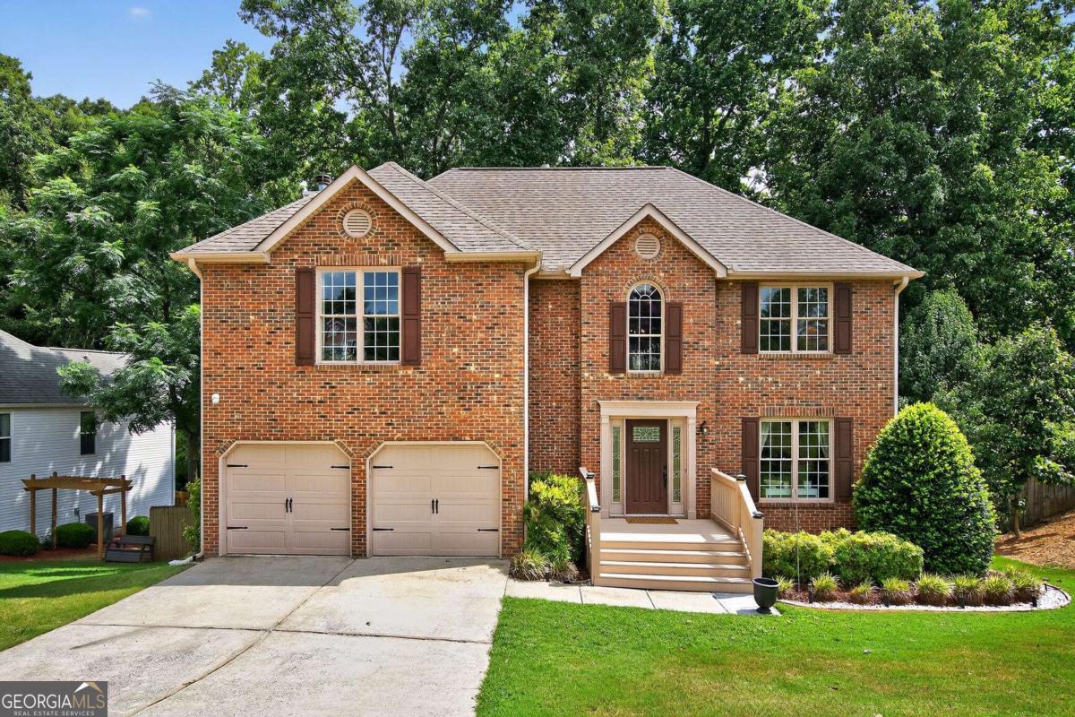 Welcome to 6005 Aderhold Way, a beautifully updated home nestled in the sought-after Shepherds Pond community in Alpharetta, with the added benefit of Forsyth County taxes. This spacious residence offers 5 bedrooms, 2 full baths, 2 half baths, and a finished basement with exterior access-perfect for a home office, gym, or future expansion. The home features a bright and welcoming layout with a fully renovated kitchen, stone countertops, hand-scraped hardwood floors, and a cozy family room with a gas fireplace. From any room in the back of the house you feel like you are in a treehouse. So private and natural. The oversized owner's suite includes a walk-in closet and tray ceiling, while additional bedrooms provide space and comfort for family or guests. Situated on nearly half an acre, the private fenced backyard includes a serene pond view and a large deck ideal for relaxing or entertaining. Residents of Shepherds Pond enjoy swim and tennis amenities, sidewalks, and a close-knit atmosphere all while having the Greenway in your backyard. Conveniently located near Avalon, Halcyon, Big Creek Greenway, and top-rated Forsyth County schools, this home offers the perfect blend of comfort, location, and lifestyle. The new Gathering will be right around the corner as well.