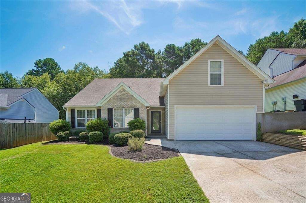 Photo of 1077 Woodsong Pass Ct, Lawrenceville, GA 30043 (MLS # 10876749)