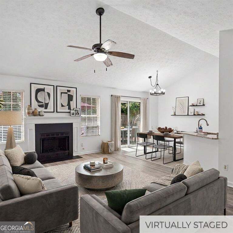 Photo of 1077 Woodsong Pass Ct, Lawrenceville, GA 30043 (MLS # 10876749)