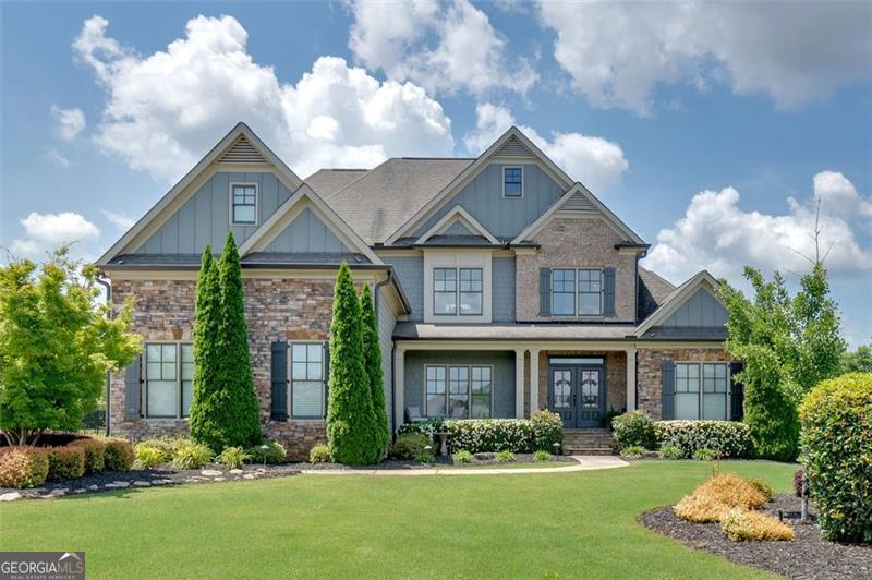 Welcome to 11 Laurel Trace - a stunning blend of luxury, comfort, and design in the heart of Cartersville's coveted city school district. This exceptional home features a backyard oasis that truly sets it apart. Enjoy your own private retreat complete with a custom Pebble Tec saltwater pool, tranquil waterfall feature, elegant gas fire pit, and lush, professional landscaping. The ambiance extends well into the evening with executive landscape lighting in both the front and back, creating the perfect setting for entertaining or relaxing under the stars. Inside, you'll find nearly 4,000 square feet of refined living space with designer touches throughout. The dramatic main level boasts an open-concept layout with soaring ceilings, a chef's kitchen featuring a gas cooktop, built-in oven, warming drawer, walk-in pantry, and wine fridge. Enjoy cozy evenings in the keeping room with wood-burning fireplace or unwind in the spacious living room with gas fireplace. The primary suite is conveniently located on the main level, with three additional bedrooms and a large media/flex room that can easily serve as a 5th bedroom-each with walk-in closets and abundant storage. Nestled in a quiet cul-de-sac, the flat, manicured yard, three-car garage, and side entry make this home as functional as it is beautiful. Additional Noteworthy Features: - Newly installed water osmosis system - Flexible layout with room for everyone - Walk-in attic storage - Priced below neighborhood comparables for exceptional value - Minutes from I-75, shopping, dining, and downtown Cartersville This one checks all the boxes. Don't miss your chance to call it home!