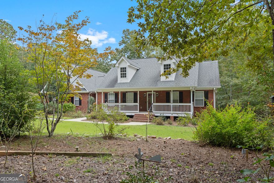 Welcome to Your Private Oasis in Winston, Georgia  Escape to this serene, private beautiful brick home, perfectly situated on a sprawling 7 acre lot in the tranquil Winston community. This property offers the perfect blend of spacious living, abundant land, and the opportunity for future expansion. The home features 3 spacious bedrooms and 2.5 well-appointed bathrooms, with a total of 2,066 square feet of finished living space. The thoughtful layout provides a comfortable and inviting atmosphere for daily living and entertaining.    This property is a rare find and offers exceptional value, providing a unique opportunity to own a large tract of land in a desirable area. It includes a massive 2,066-square-foot unfinished basement and a 336-square-foot finished attic/Bonus area providing endless possibilities for a home theater, gym, additional bedrooms, or a private home office.    Step outside and enjoy the peaceful surroundings from your choice of two charming porches. The home's brick exterior is complemented by beautiful landscaping, creating a welcoming curb appeal. A built-in 2-car garage provides convenience and ample storage.    The vast acreage provides a blank canvas for your vision, whether it's adding a pool, a garden, or simply enjoying the natural beauty. Don't miss the chance to own this exceptional home, where country living meets modern convenience. Schedule your private showing today and discover the perfect place to build your future.