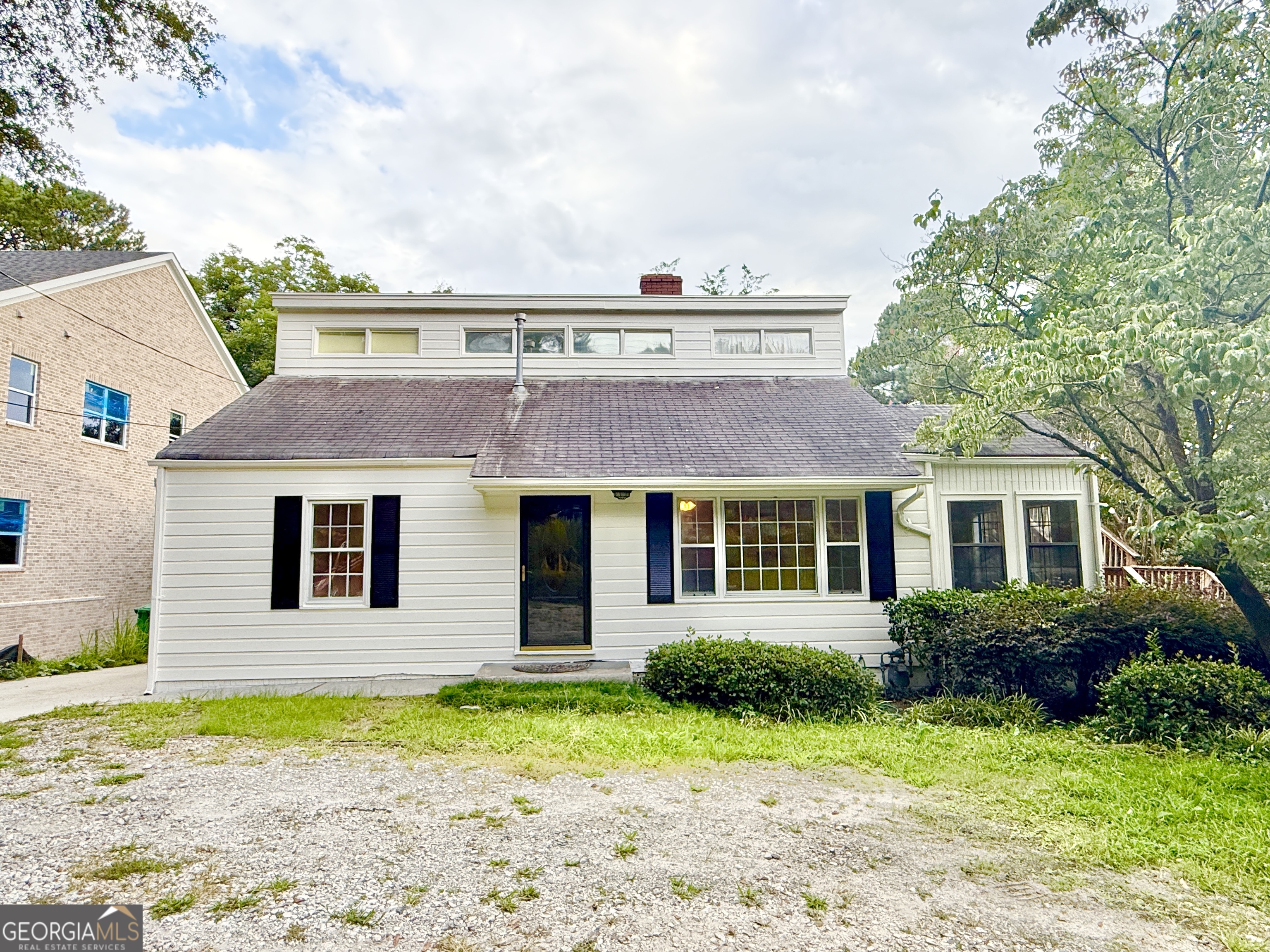 Large home with 2 bedrooms 1 bathroom on main level home with family room with fireplace, separate dining room & enclosed porch on back of home overlooking large deck. 2nd level has a separate spacious 1 bedroom 1 bathroom apartment with private entry, family room & separate kitchen & deck. Great location walking distance to the heart of Brookhaven and just minutes from downtown Chamblee, shopping and many restaurants.