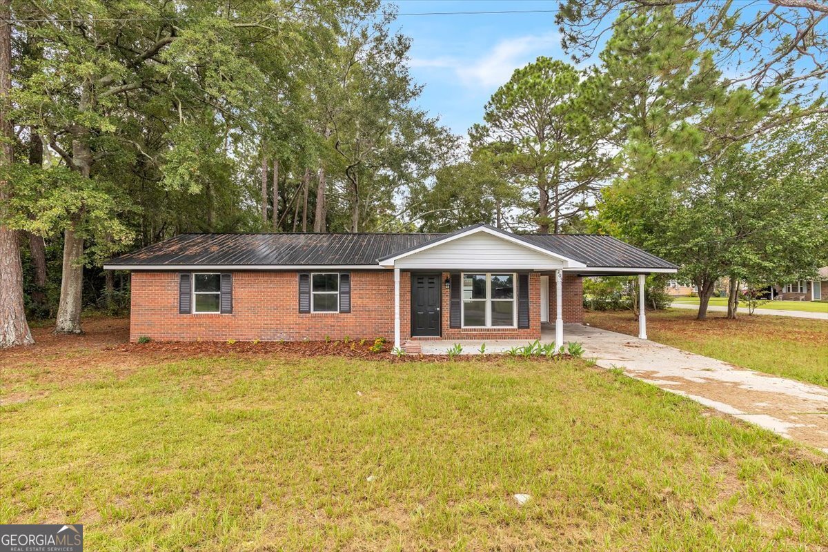 This charming 3-bedroom, 1-bath ranch-style home has been thoughtfully updated and is move-in ready. Featuring a brand-new roof, fresh paint, and new flooring throughout, this home offers a fresh, modern feel while maintaining its cozy character. The functional floor plan includes a bright living area, a spacious kitchen, and comfortable bedrooms. Situated on a .21-acre lot, the property also includes a one-car carport and outdoor space for relaxing or entertaining. This home is the perfect opportunity for first-time buyers, downsizers, or investors. Don't miss your chance to make it your own!