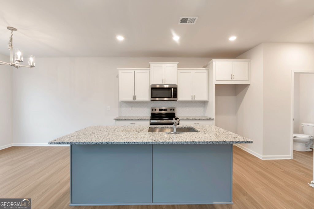 Photo of 160 Millers Lane, Calhoun, GA 30701 (MLS # 10867829)