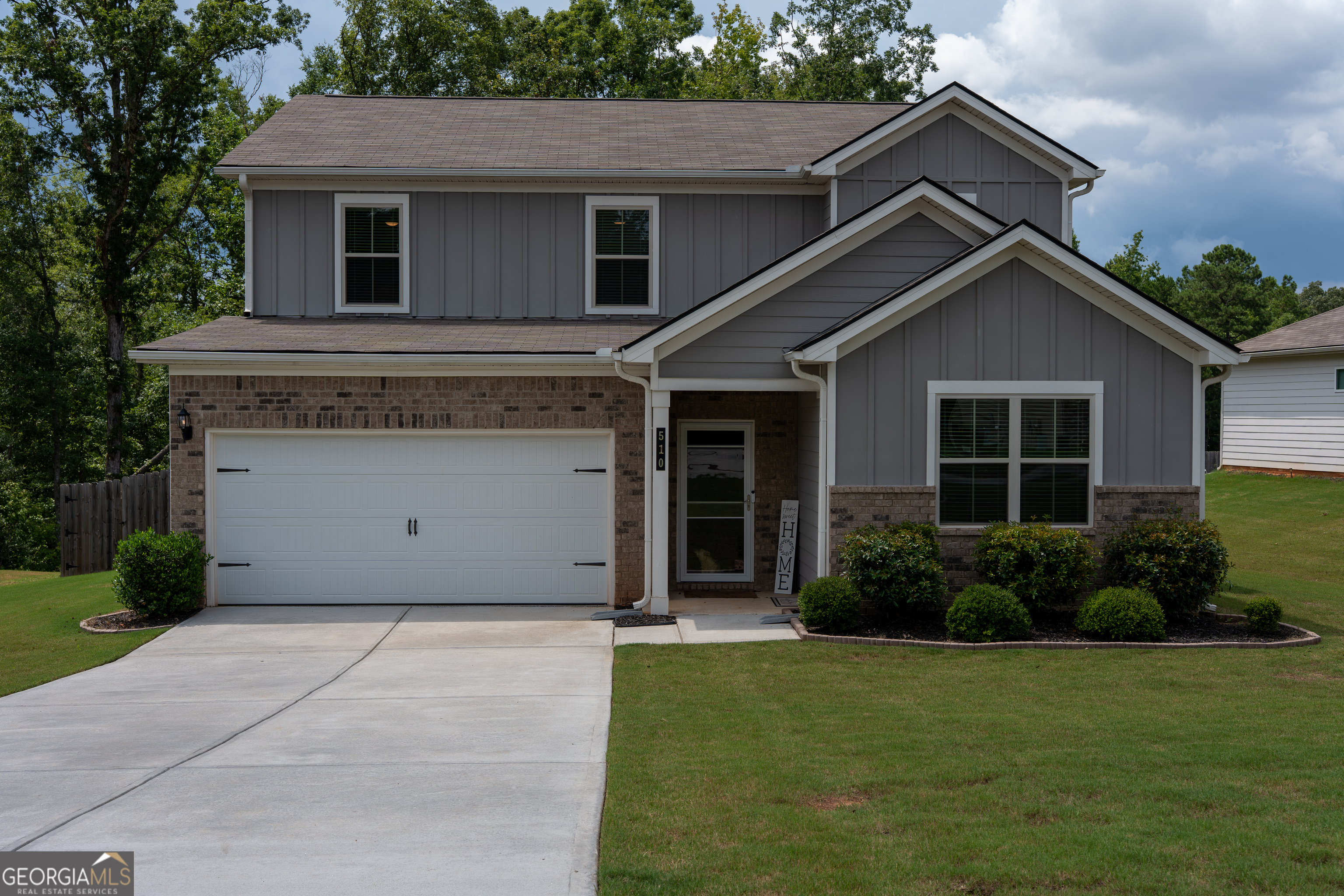 Seller is Extremely Motivated - Bring All Offers! Welcome to 510 Curry Ridge Court, a stunning 5-bedroom, 3-bathroom home offering 2,659 square feet of thoughtfully designed space, built in 2020 with comfort and style in mind. Step into a bright, open-concept layout featuring a spacious living and dining area, a chef-ready kitchen with granite countertops, 36" white cabinetry, and smart home features for modern living. Entertain with ease in the fully enclosed patio, fenced backyard, or enjoy bug-free breezes with the sliding screen garage door and sleek epoxy-coated garage floor. With five versatile bedrooms, you can create the perfect home theater, office, gym, guest room-or simply enjoy the extra space for storage and hobbies. Located in the desirable Laurel Creek community, you're minutes from Tanger Outlets, The Brickery, Old Bradley's Tavern, and just a short drive to the charm of McDonough Square. This move-in ready home is priced to sell and packed with value. The seller is ready to make a deal-don't miss your chance to own one of the best buys in Locust Grove!