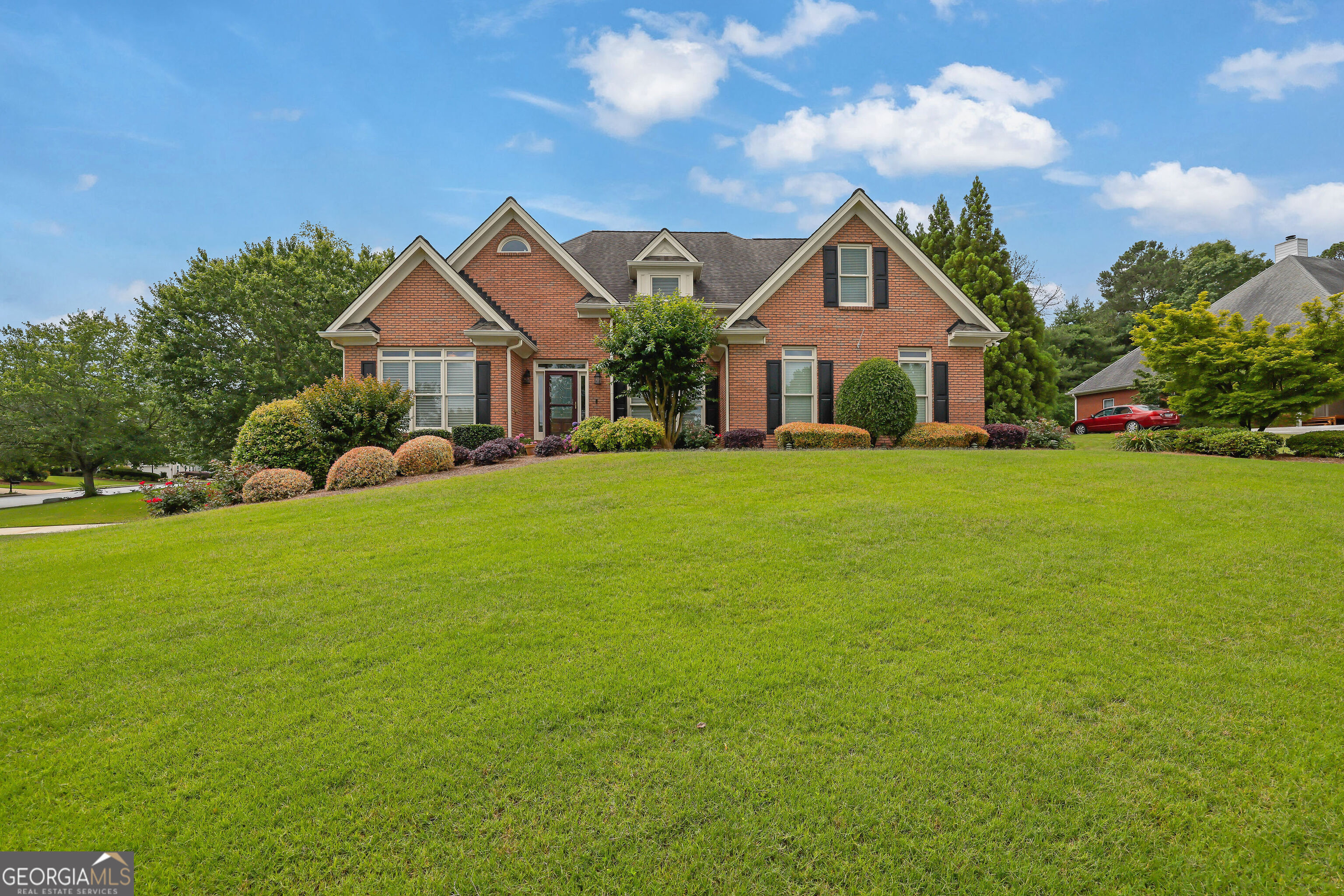 Stately 5-Bedroom Home in the Sought-After Grayson School District Welcome to this elegant and spacious 5-bedroom, 4.5-bath home boasting over 3,700 square feet of thoughtfully designed living space. Nestled on a corner lot with a charming diagonal orientation, this property offers a warm "welcome home" feel the moment you arrive. The main level features an oversized master suite with private access to a large, screened-in back deck-perfect for relaxing or entertaining. The deck is outfitted with durable LVP flooring, a ceiling fan, and a TV mount for year-round enjoyment. The fenced and landscaped backyard offers privacy and plenty of room to play or garden. The heart of the home is a beautifully updated kitchen complete with granite countertops, tile backsplash, gas cooktop, double ovens, newer white cabinetry, and a walk-in pantry with direct access to the laundry room. Upstairs, you'll find three additional bedrooms and a unique catwalk-style hallway that enhances the home's open, airy feel. The fully finished in-law basement suite offers incredible flexibility, complete with its own garage, generous storage, and both interior and private exterior entrances. Whether you need multigenerational living space or are looking for an income-producing opportunity, this versatile setup has you covered. This home combines timeless charm with modern upgrades-don't miss your chance to own a truly unique property in a top-rated school district!