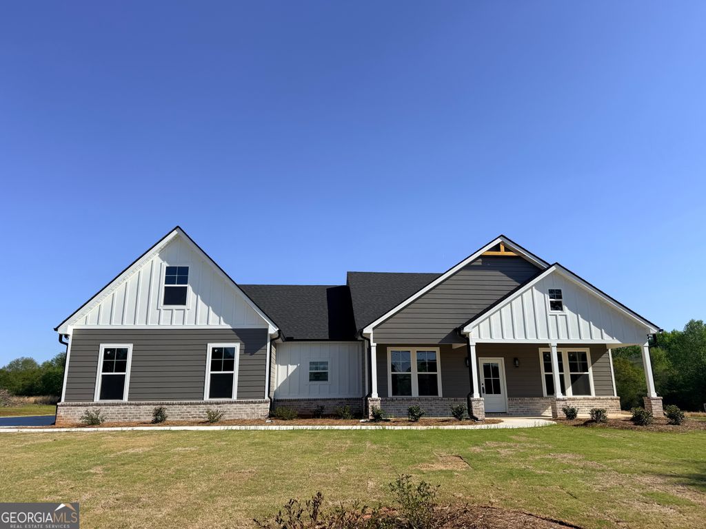 Photo of 1205 Rocky Creek Road, Locust Grove, GA 30248 (MLS # 10754620)