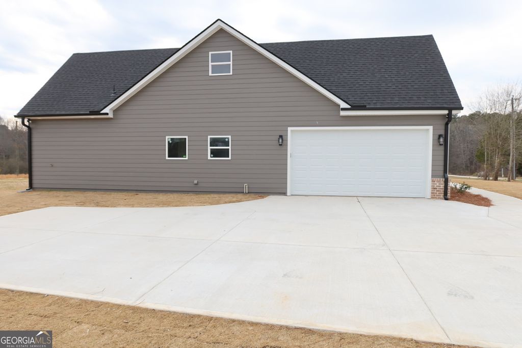 Photo of 1205 Rocky Creek Road, Locust Grove, GA 30248 (MLS # 10754620)