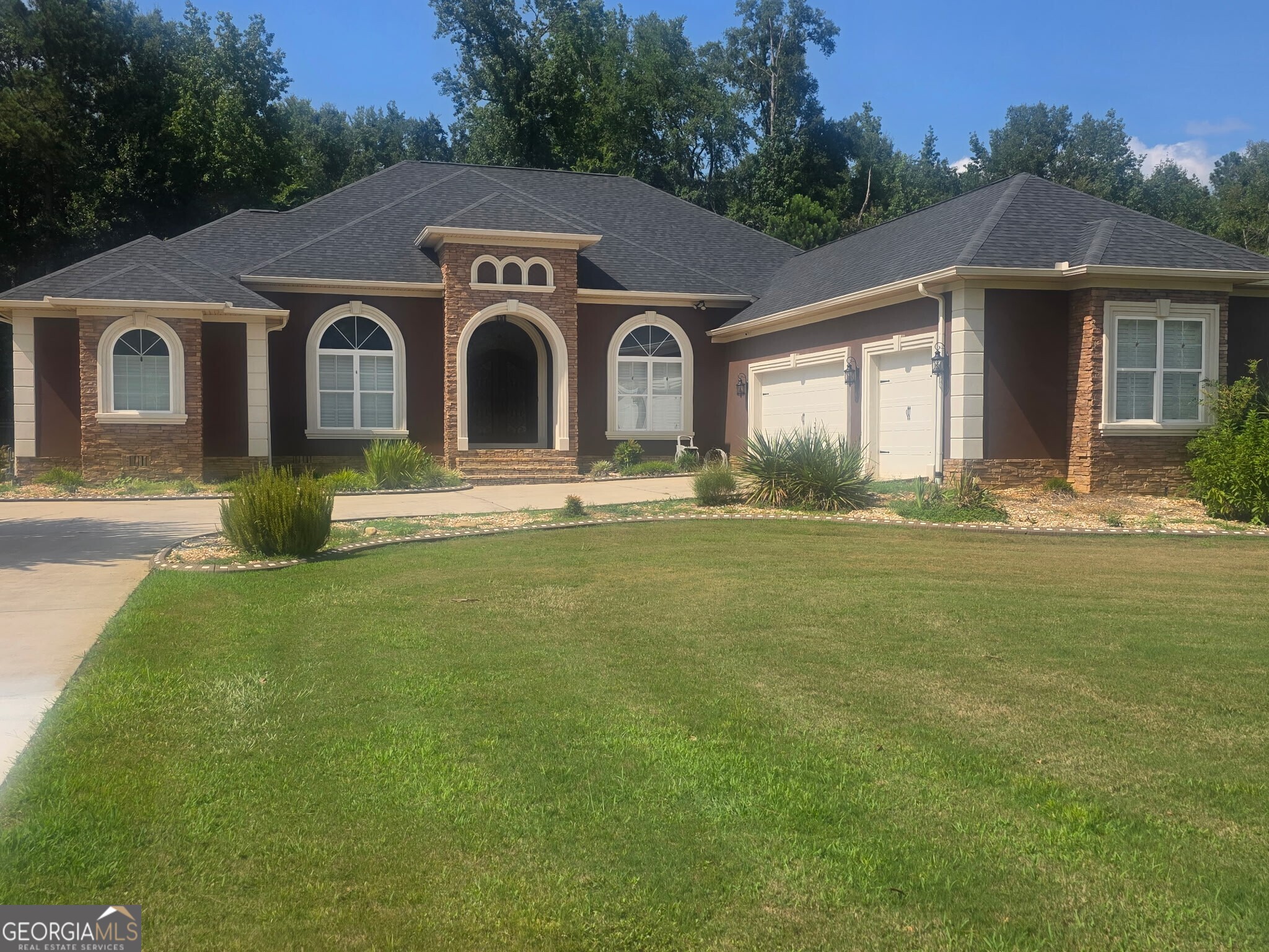 This is it! Custom-Built Brick Home All On One Level. Five bedrooms, 4 full baths, Beautiful wood floors, newer carpet, chefs kitchen, 5 burner gas stove, built-in oven & microwave, granite countertops, custom cabinetry, large owners suite with a large bathroom, double vanities, huge walk-in shower & tile floors and a cozy fireplace. Step out to a covered patio overlooking a luxury swimming pool. Newer roof and many upgrades.