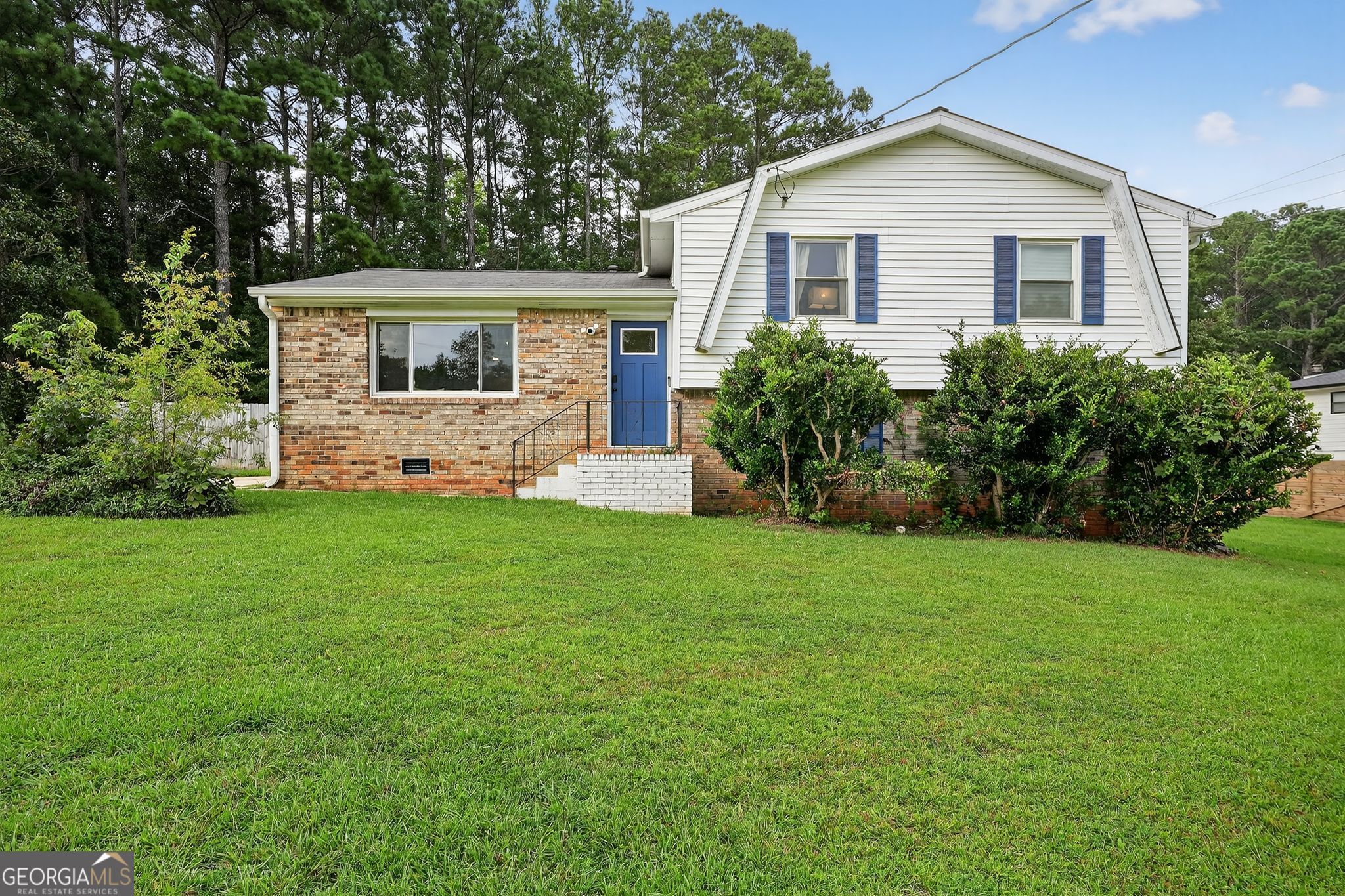 Wonderfully updated cozy home minutes from Smyrna with a massive front and gated back, private lot. Large corner lot allows you to extend your living space outdoors. The home has been meticulously maintained and modernized. Thoughtfully updated living space with stainless steel appliances and a newly added entertainment room. All at a competitive price! You must see this gem nestled in a quiet yet convenient neighborhood with no HOA. This home is in close proximity to the Battery, Marietta Square, and city of Mableton/Vinings. The master bedroom has a huge walk-in closet and include a separate shower and soaking tub where you can unwind. If you're looking for a peaceful setting and everyday conveniences, you must see this home!