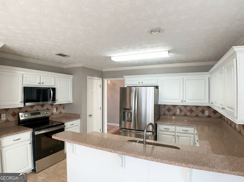 Photo of 4306 Foxberry Run, Loganville, GA 30052 (MLS # 10689079)