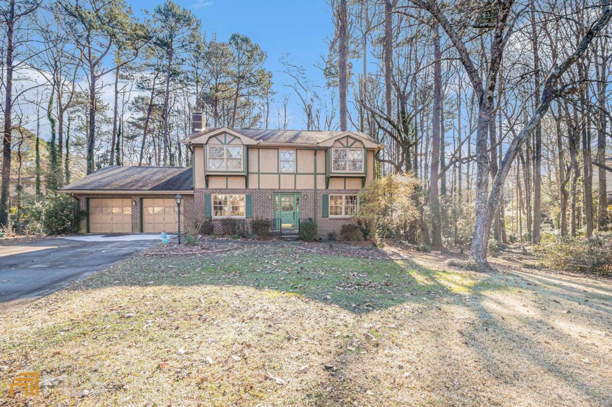 MUST SEE! This property has a lot to offer. New kitchen, new bathrooms, new flooring, and new fixtures. Lots of storage space. Huge screened porch overlooks an almost completely private backyard. Very rare in this area. Quiet street. No HOA. Don't miss this opportunity!