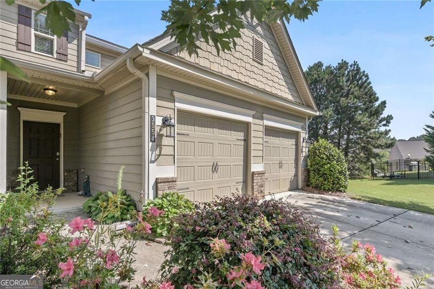 Gorgeous end unit townhome in sought after The Villages at Castleberry. Master on Main, Open floor plan, Hardwoods throughout the main floor. Spacious family room that leads to screened in back patio. Granite Kitchen with an island/breakfast bar, gas range, refrigerator, microwave, dishwasher and pantry. 2 Car Garage leads straight into the kitchen with washer and dryer in the hall. Two large bedrooms upstairs with a loft area as well. Fully fenced oversized backyard. Lawn care included. The Villages of Castleberry amenities include Swim/tennis/playground.