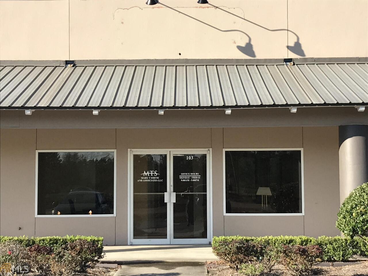 MONTHLY RENT REDUCED!! Great visibility from Hwy 40 and good traffic pattern. Building recently renovated. Currently set up for office space which includes lobby area, conference room, several offices and break room in back. Great for Attorney, insurance, or business office space. Ready for move in.