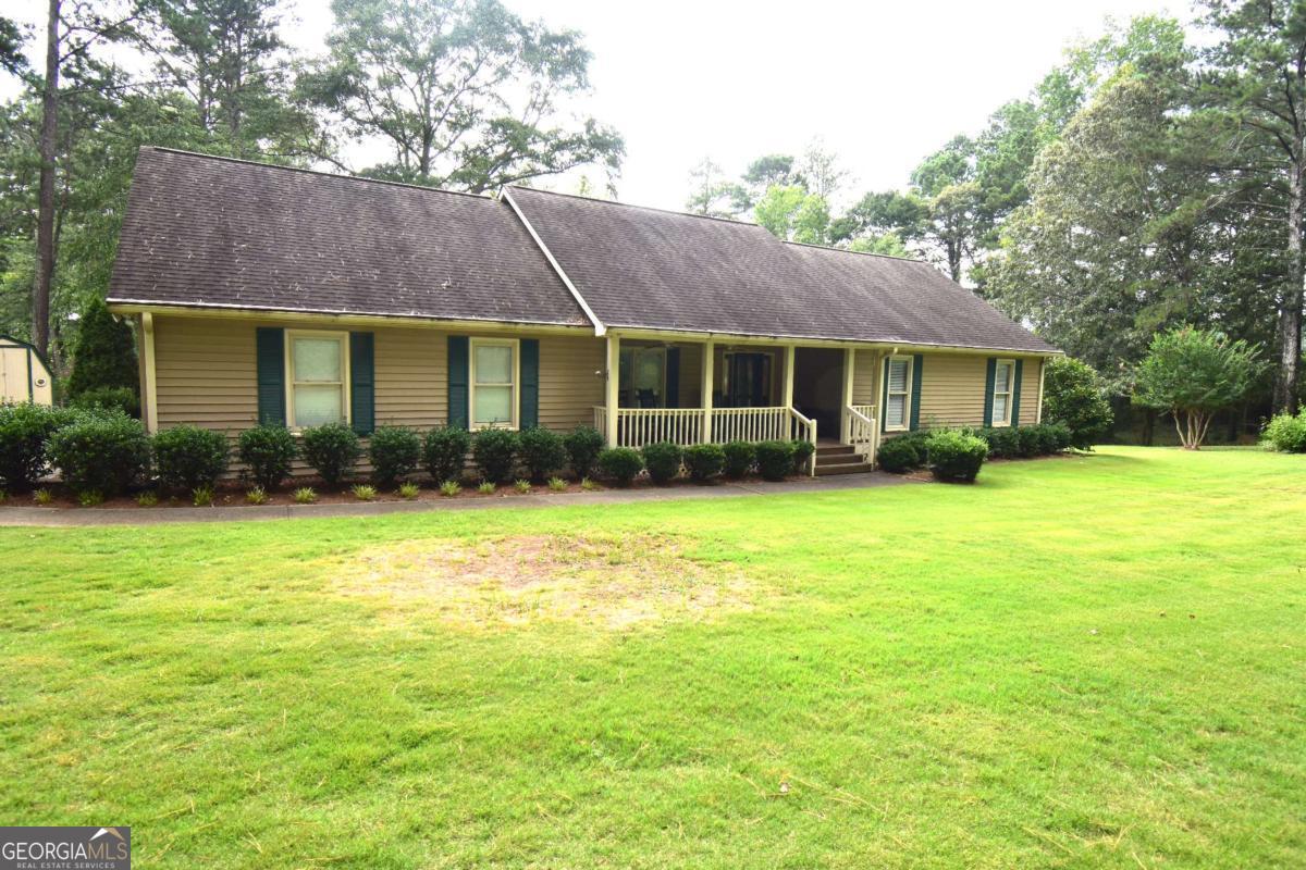 This property includes 3168 and 3178 Bailey Road for a total of 2.41 acres. One level living at its best!! Sprawling ranch with three bedrooms, two full baths and a bonus room upstairs that could be used as a 4th bedroom. The great room is very large with a warm stone fireplace, Kitchen is warm and inviting with private breakfast area and formal dining room. Don't miss this great home! Here today and gone tomorrow!!