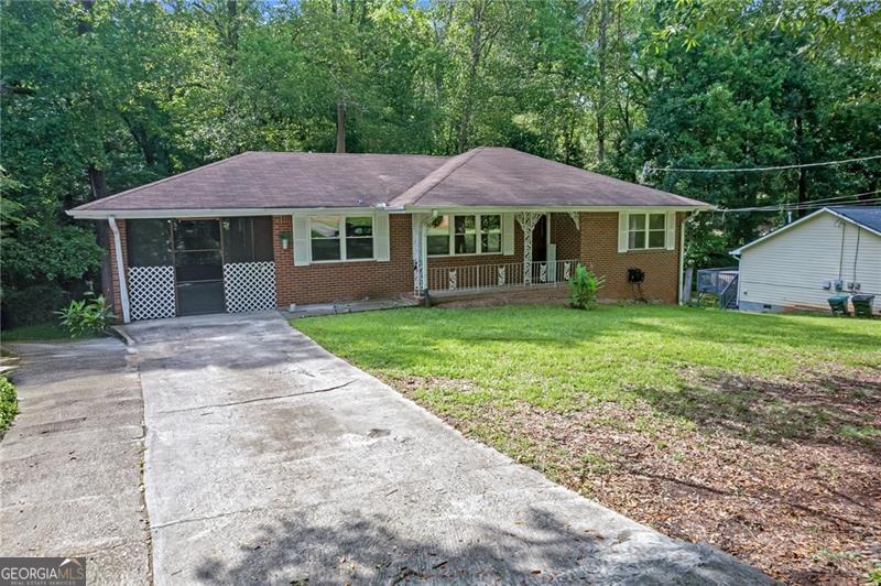 Charming Brick Ranch in Growing Mableton! This move-in-ready home features a beautifully renovated kitchen and a modern master bathroom, hardwood floors throughout, and a newer roof and HVAC system for peace of mind. Located in a quiet, established community with easy access to shopping centers, schools, and major roadways. Don't miss this opportunity to own a stylish and comfortable home in one of Mableton's up-and-coming areas! Rental requirements include credit check, good rental history, minimum household monthly income $5,000, security deposit equal one month's rent. Rental application $50 per adult online https://apply.link/mODUyHk