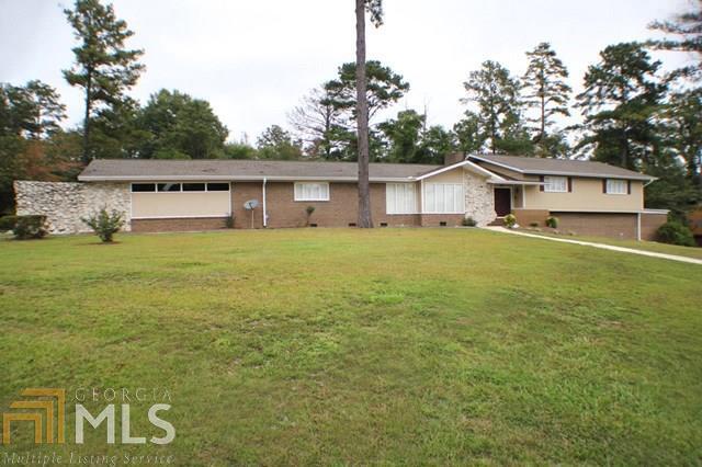 No expense spared in this completely updated home. Truly a beautiful property sitting atop 2.5 acres. 2 living spaces plus a full basement with wet bar & movie theater. Property also boasts of a great outdoor area featuring in ground pool, tennis/basketball court and tons or privacy. Majority of furniture and other house hold goods to stay with accepted offer. Call today for additional information.