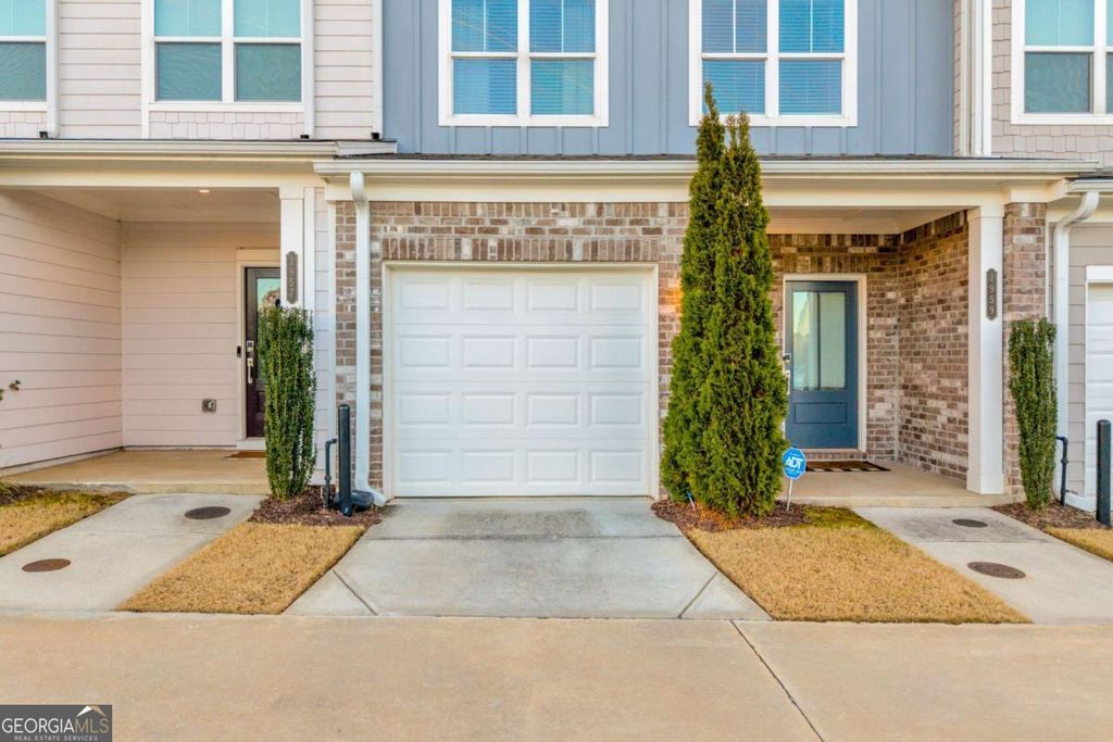 Photo of 1959 Hidden Heights NW, Atlanta, GA 30318 (MLS # 10680558)