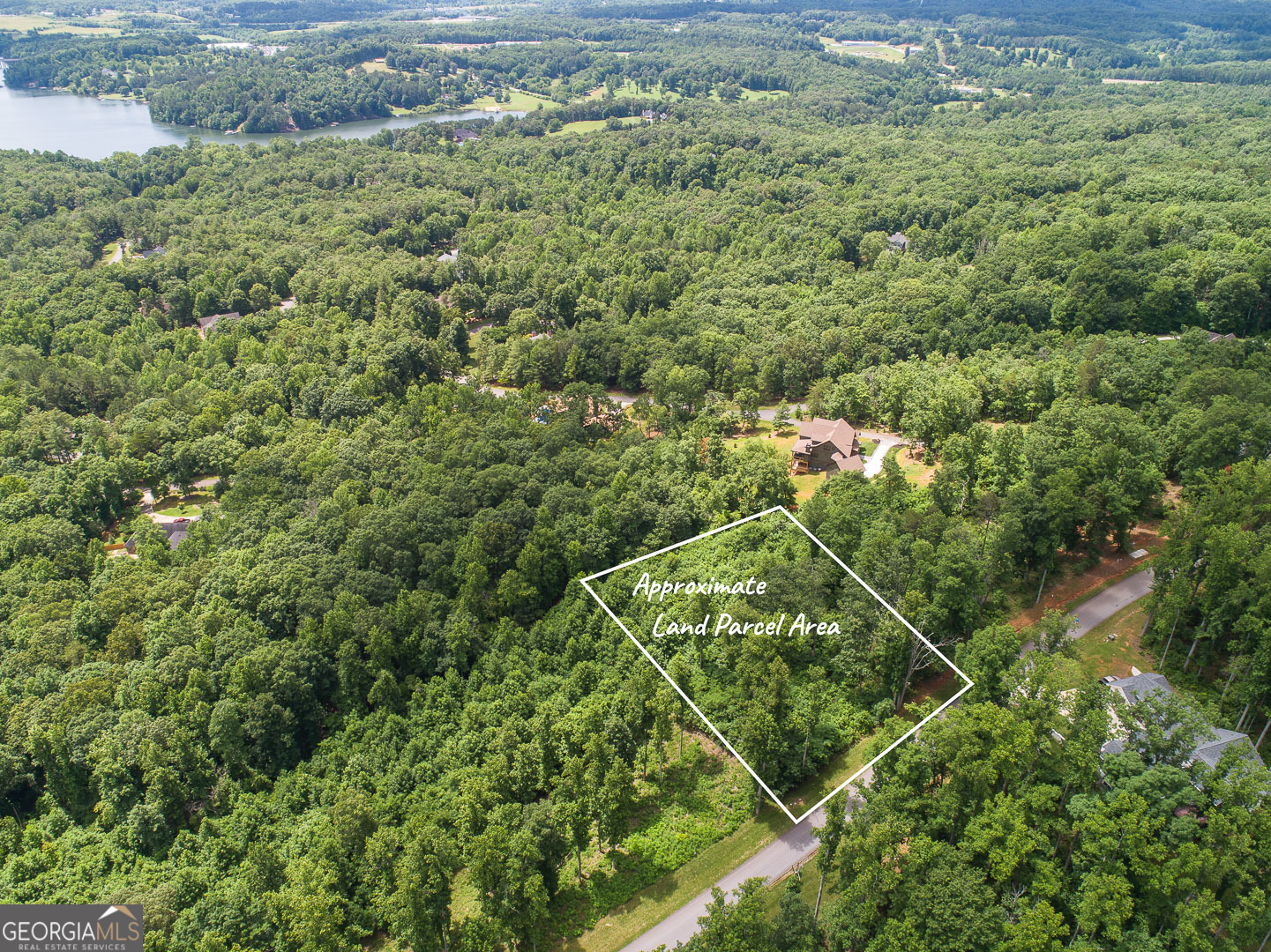 Mountain View Lot with Private Boat Slip in Gated Highland Park! Welcome to Lot 63-a stunning homesite in the coveted Highland Park community on Lake Nottely. Featuring long-range mountain views, a private boat slip, and a serene setting, this property offers the ideal canvas for your dream home in the North Georgia mountains. Located in a gated lakeside community, this lot includes underground utilities, fiber optic internet, public water, and power at the street-ready for immediate build. Spend your days boating or fishing on Lake Nottely, then relax at the luxury clubhouse with a saltwater infinity pool, fitness center, game room, movie theater, and outdoor fire pit with grilling area. Just 4 miles from downtown Blairsville, you'll enjoy easy access to boutique shopping, dining, and seasonal festivals-all while soaking in the beauty of nature. Opportunities like this-with both a view and a dock slip-are few and far between. Make this your mountain lake retreat!