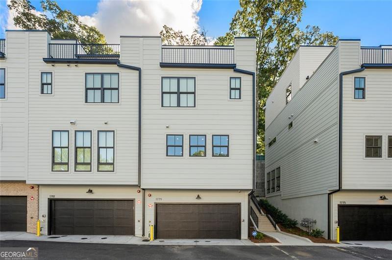Modern 3-bed townhome in Beckham Place at Morningside! This 4-story 2025 Toll Brothers home offers 3 bedrooms, 3.5 baths, open rear-kitchen layout, flex space, and 2-car garage with EV outlet. Features include designer finishes, rooftop terrace with skyline views, and a private location with no direct rear neighbors. Overlooks the community's resort-style pool and cabana. The spacious primary suite includes a walk-in closet, double vanity, and glass shower. Bonus loft is ideal for a home office or den. Includes smart home features and energy-efficient construction. Located near Piedmont Park, the Atlanta BeltLine, nearby schools, dining, and easy access to I-85 and GA-400. HOA provides low-maintenance living!