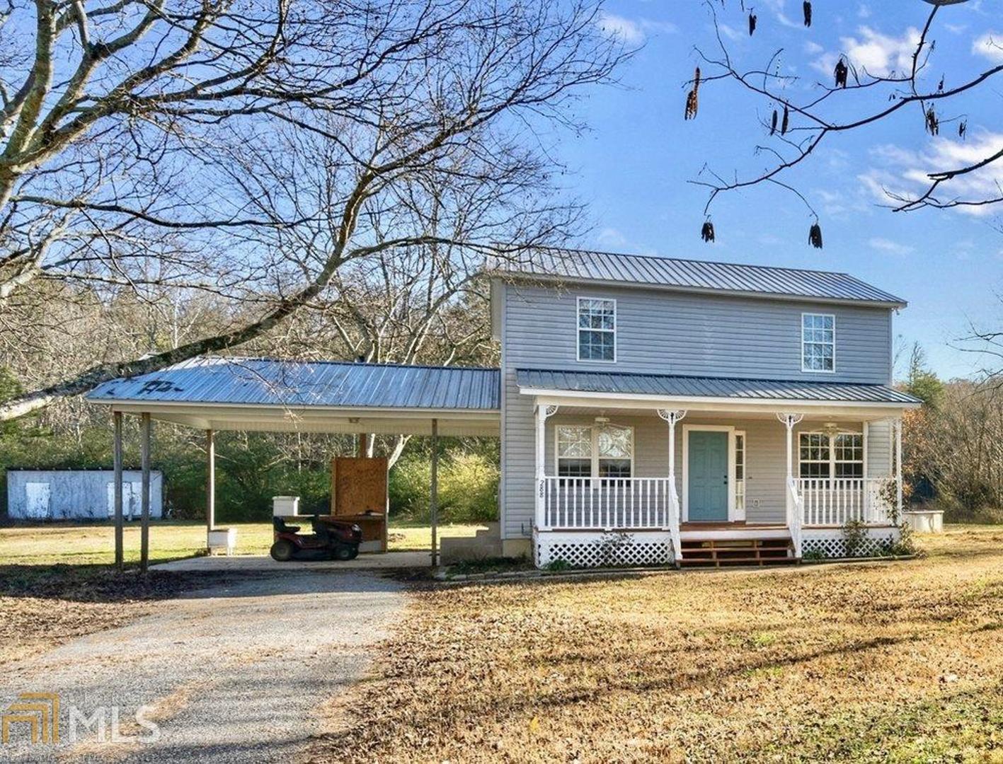 Enjoy this private, country setting on 4.25 acres! Two-story home with metal roof and large, welcoming front porch, just waiting for your rocking chairs. Home features fresh interior paint, entry foyer, family room with gorgeous hardwood floors and wood-burning stove, separate dining room, kitchen with stainless appliances including new stove & microhood, separate laundry room. Don't forget to check out the private backyard oasis, great for entertaining with over-sized deck includes a covered area and an above ground pool. Front porch and back deck freshly stained. A great opportunity with 4.25 acres, includes two lots!