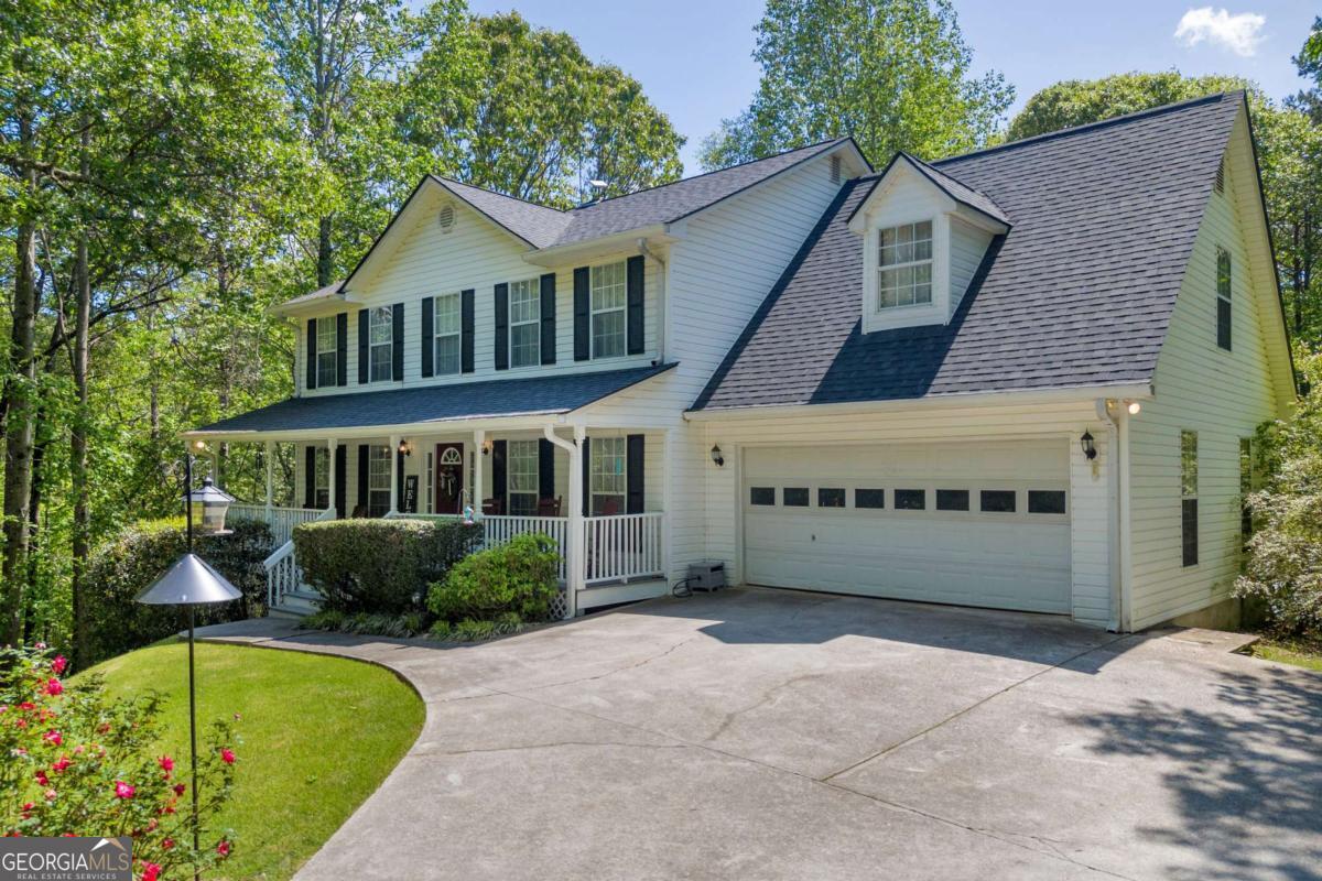 Woodland Retreat Bordering National Forest - 4BR Home on 6+ Acres Tucked away in a serene woodland setting, this stunning 4-bedroom, 2.5-bath home sits on over 6 acres and backs directly to more than 500 acres of pristine National Forest-offering unparalleled privacy, natural beauty, and abundant wildlife. Both roof and AC units are only 5 years old! The beautifully maintained grounds provide a tranquil oasis, while the remodeled kitchen and gleaming hardwood floors throughout the home reflect thoughtful updates and timeless elegance. With over 2,000 square feet of finished living space, the main level features a spacious dining room, a dedicated office, and a cozy yet refined layout ideal for everyday living and entertaining. Step out onto the screened-in back porch to experience the peace of the surrounding forest-perfect for morning coffee or evening relaxation. A full unfinished basement offers endless possibilities for expansion, whether you're envisioning a recreation room, guest suite, or workshop. The property also boasts a large covered carport ideal for RV storage or additional parking. This rare gem offers the perfect blend of comfort, space, and nature's beauty-your own private sanctuary awaits.