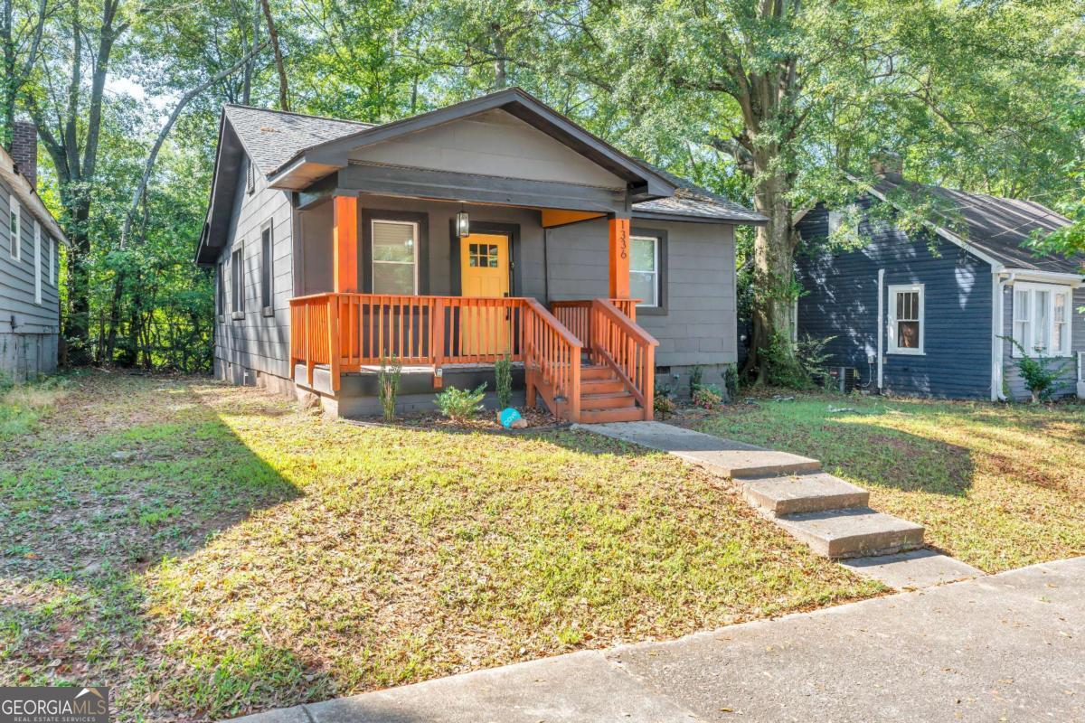 Welcome to 1336 McClelland Ave, an impeccably renovated, Airbnb-ready home in the heart of East Point-a vibrant, community-oriented neighborhood offering prime access to Atlanta's arts and entertainment. This soundproofed gem combines privacy and city convenience, making it ideal for modern living or as a smart investment. With a short walk to MARTA and bus lines, commuting and exploring the city is effortless. Inside, an open layout welcomes you into a stylish kitchen with stainless steel appliances and sleek stone countertops, perfect for casual dining or entertaining. The high-end bathrooms feature contemporary fixtures and finishes, adding a luxurious touch to daily routines. With no rental restrictions, this property is perfect for investors interested in the short-term rental market near Tyler Perry Studios and the Beltline. Nearby North Camp Creek Parkway Nature Preserve and Stone Hogan Park offer miles of trails for outdoor enjoyment, while major highways and Hartsfield-Jackson Airport are just a quick drive away. Ideal for first-time buyers, film industry professionals, or investors, this home combines modern amenities with serene, accessible city living. Schedule a viewing today and see why East Point is becoming one of Atlanta's most promising neighborhoods.